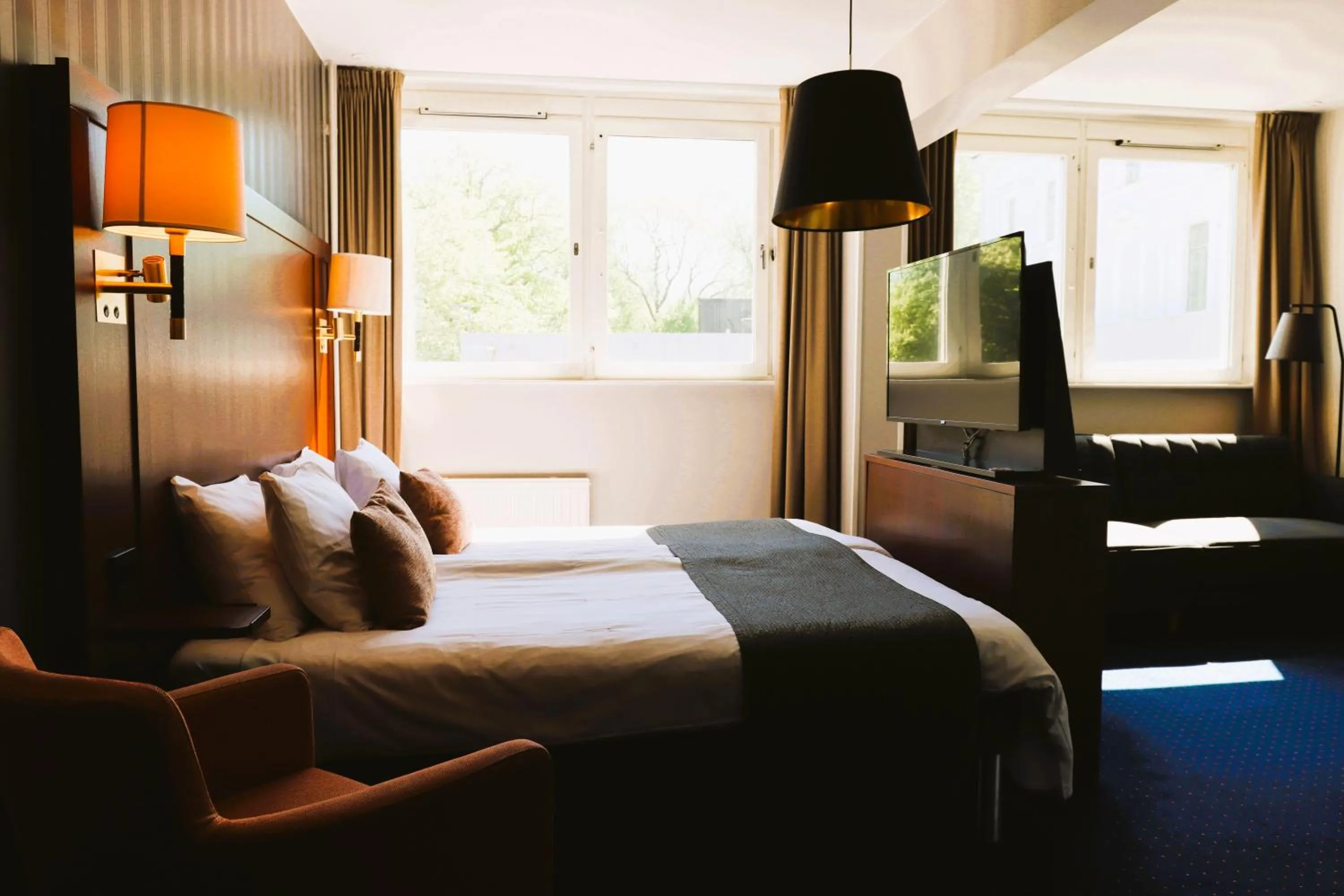 Bed in Vänerport Stadshotell i Mariestad