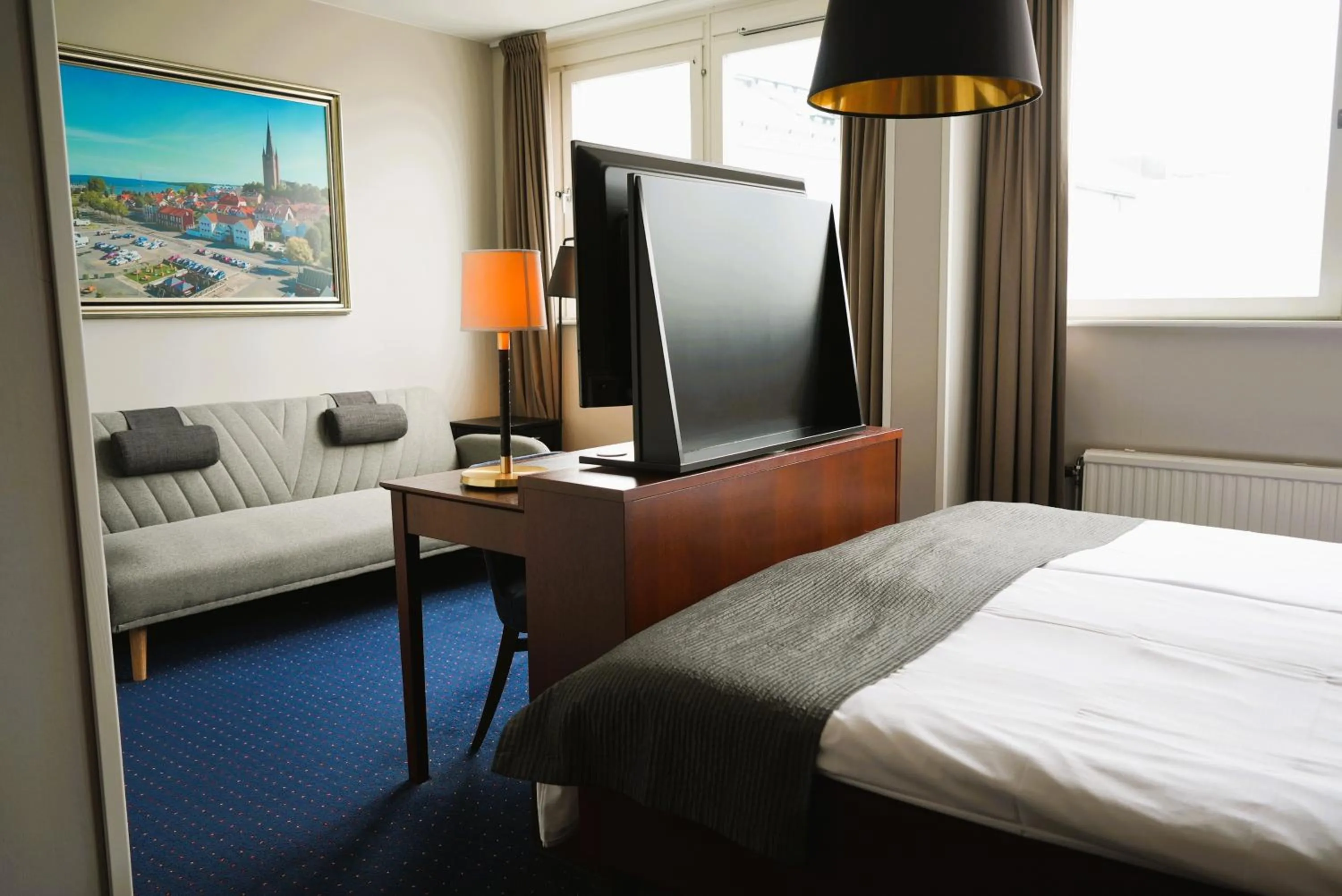 Bed in Vänerport Stadshotell i Mariestad