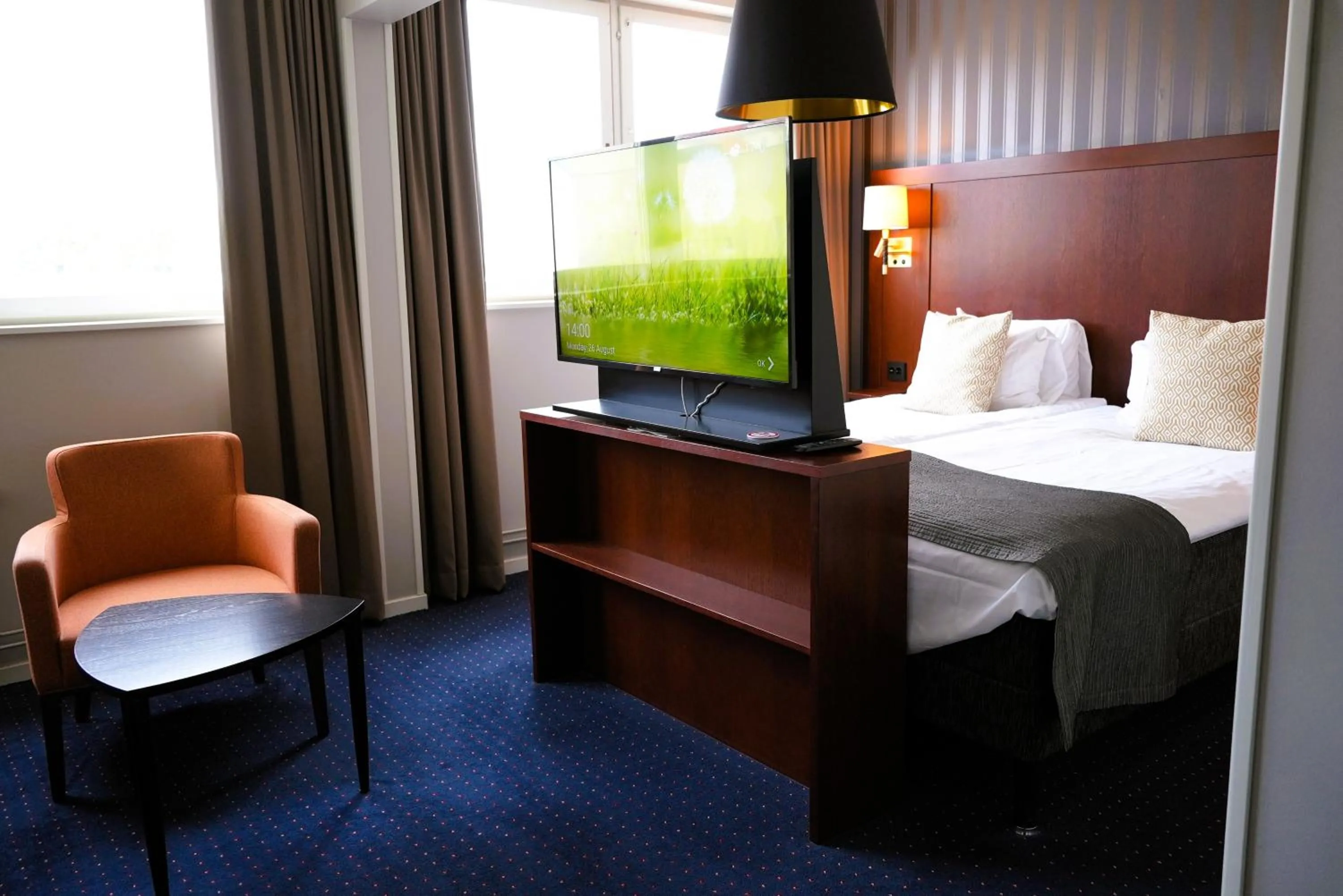 Bed in Vänerport Stadshotell i Mariestad