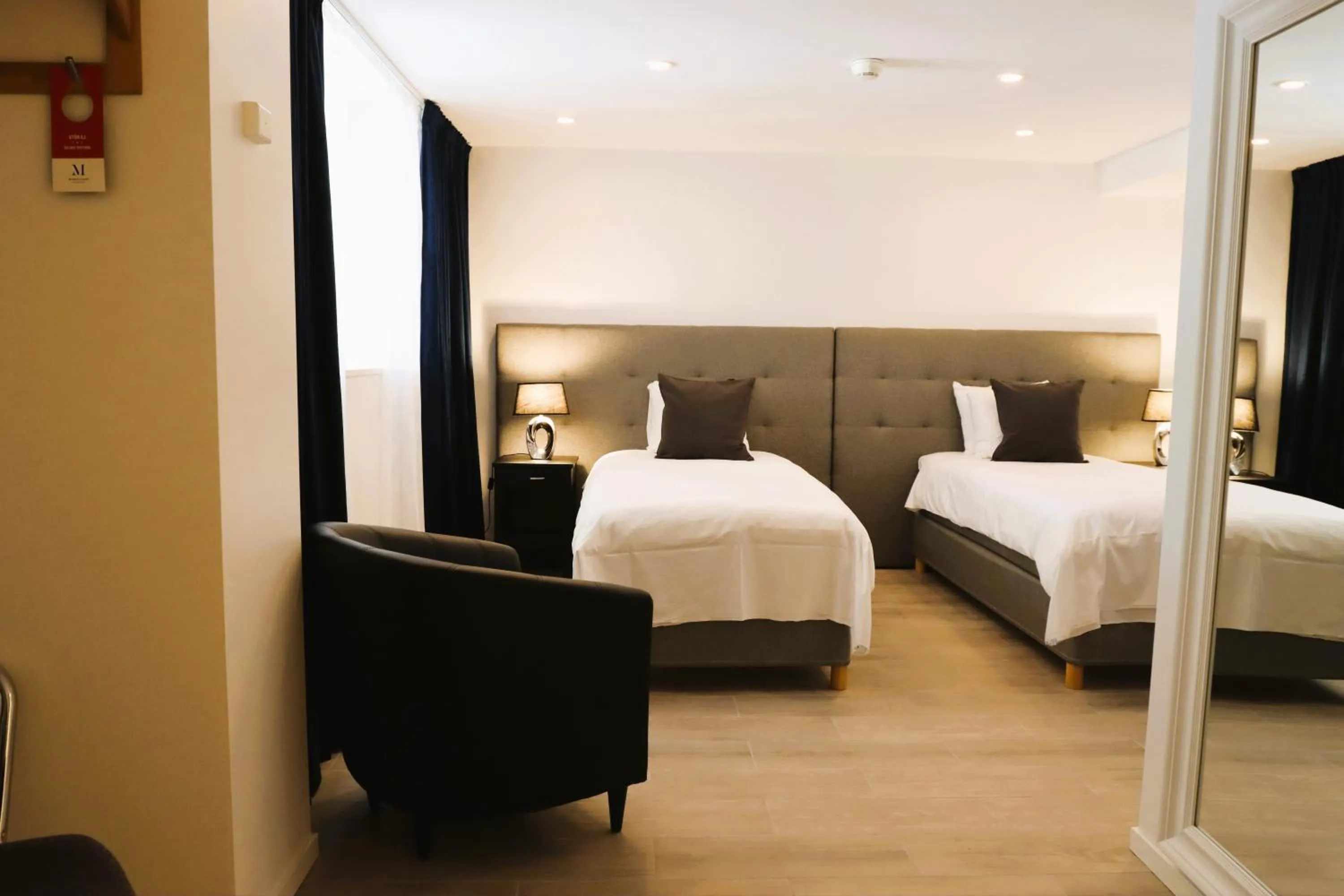 Bed in Vänerport Stadshotell i Mariestad