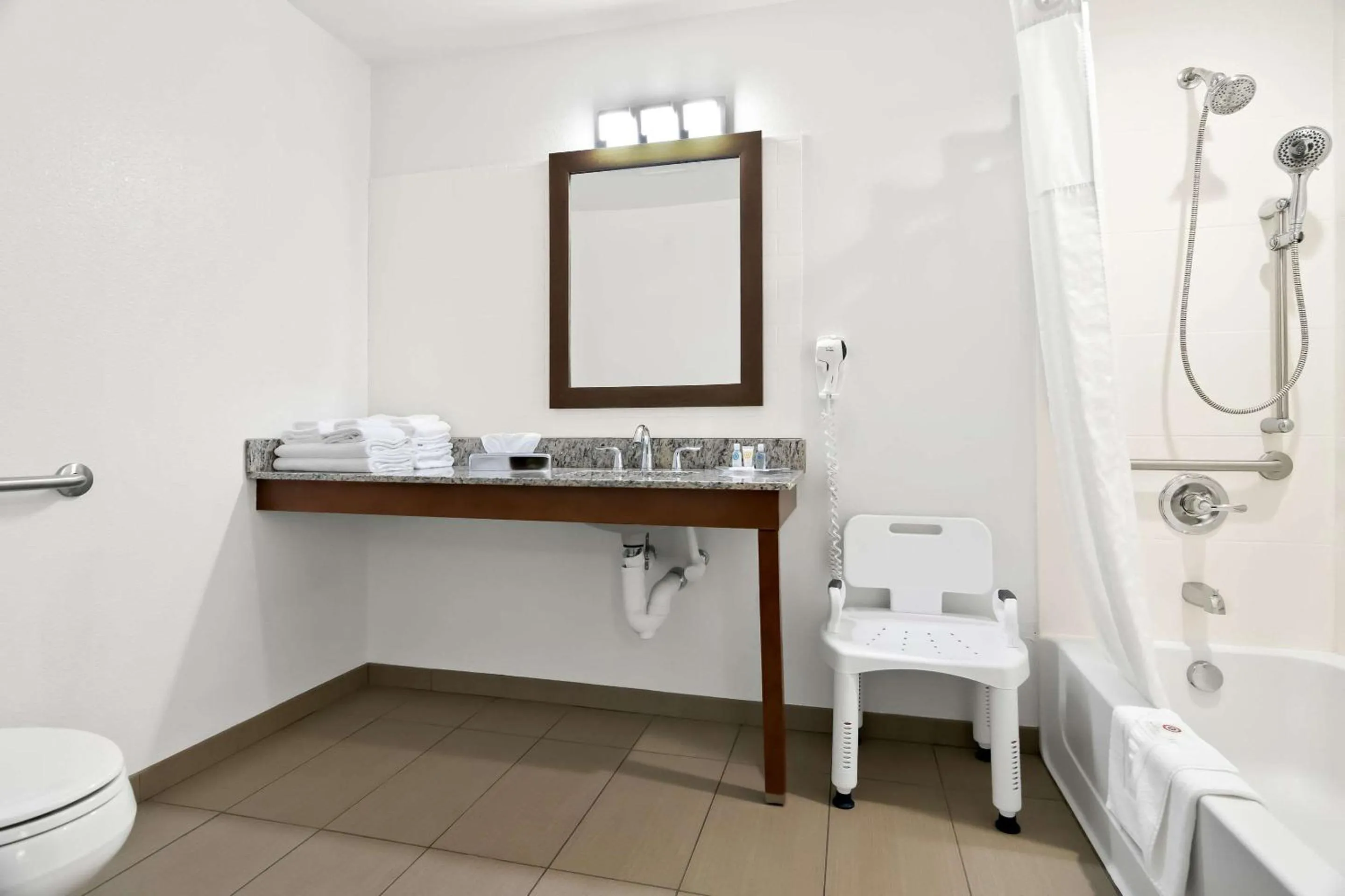 Bedroom in Comfort Suites Rensselaer near Fair Oaks