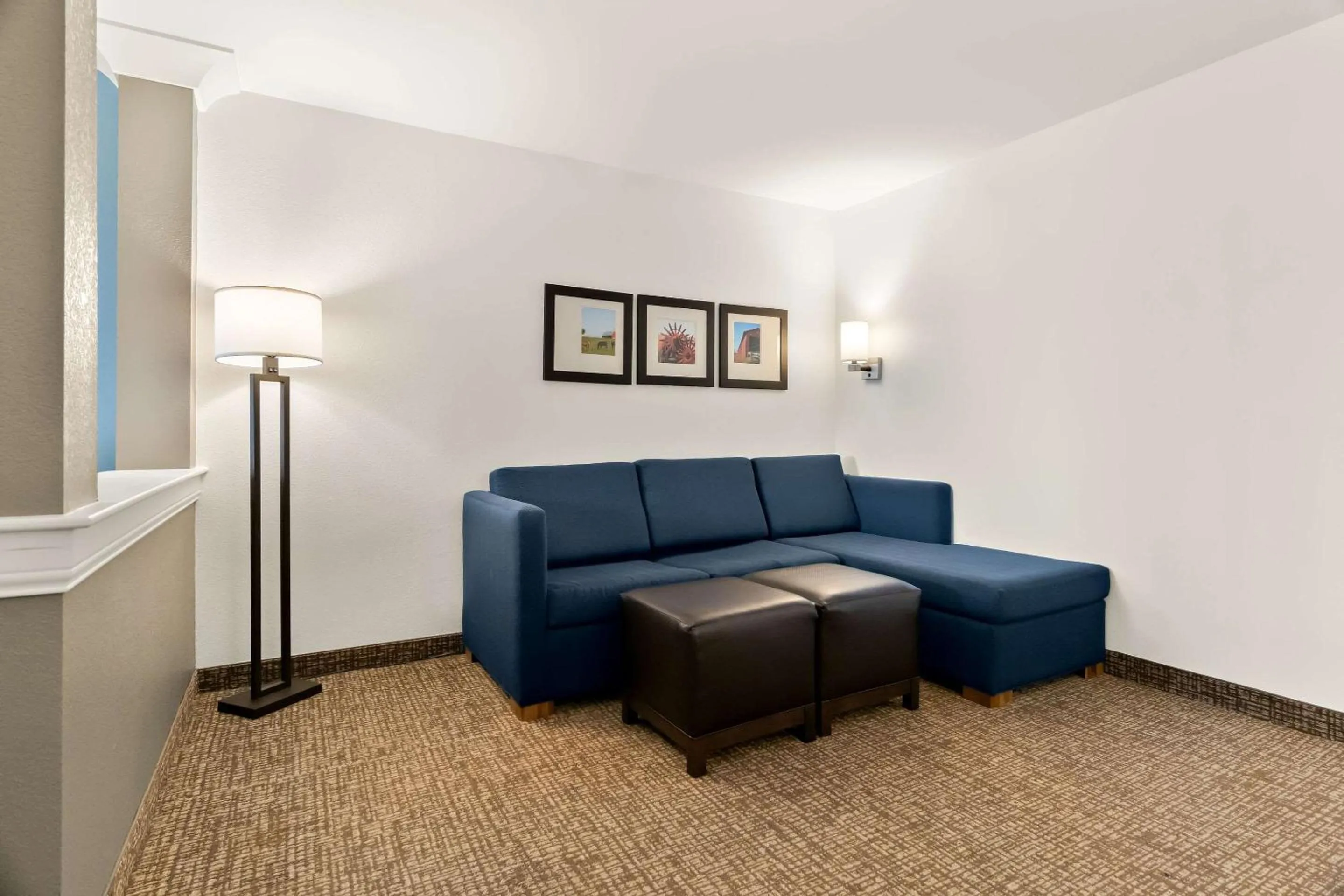 Bedroom in Comfort Suites Rensselaer near Fair Oaks