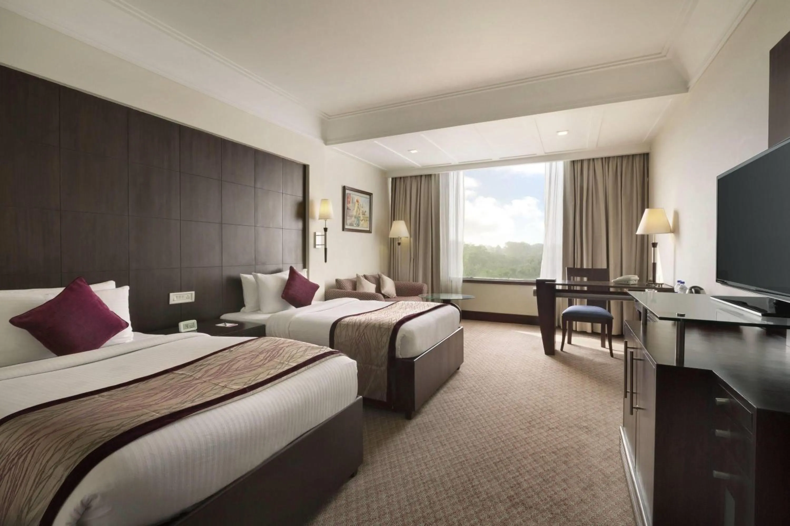 Photo of the whole room, Bed in Ramada Plaza by Wyndham JHV Varanasi