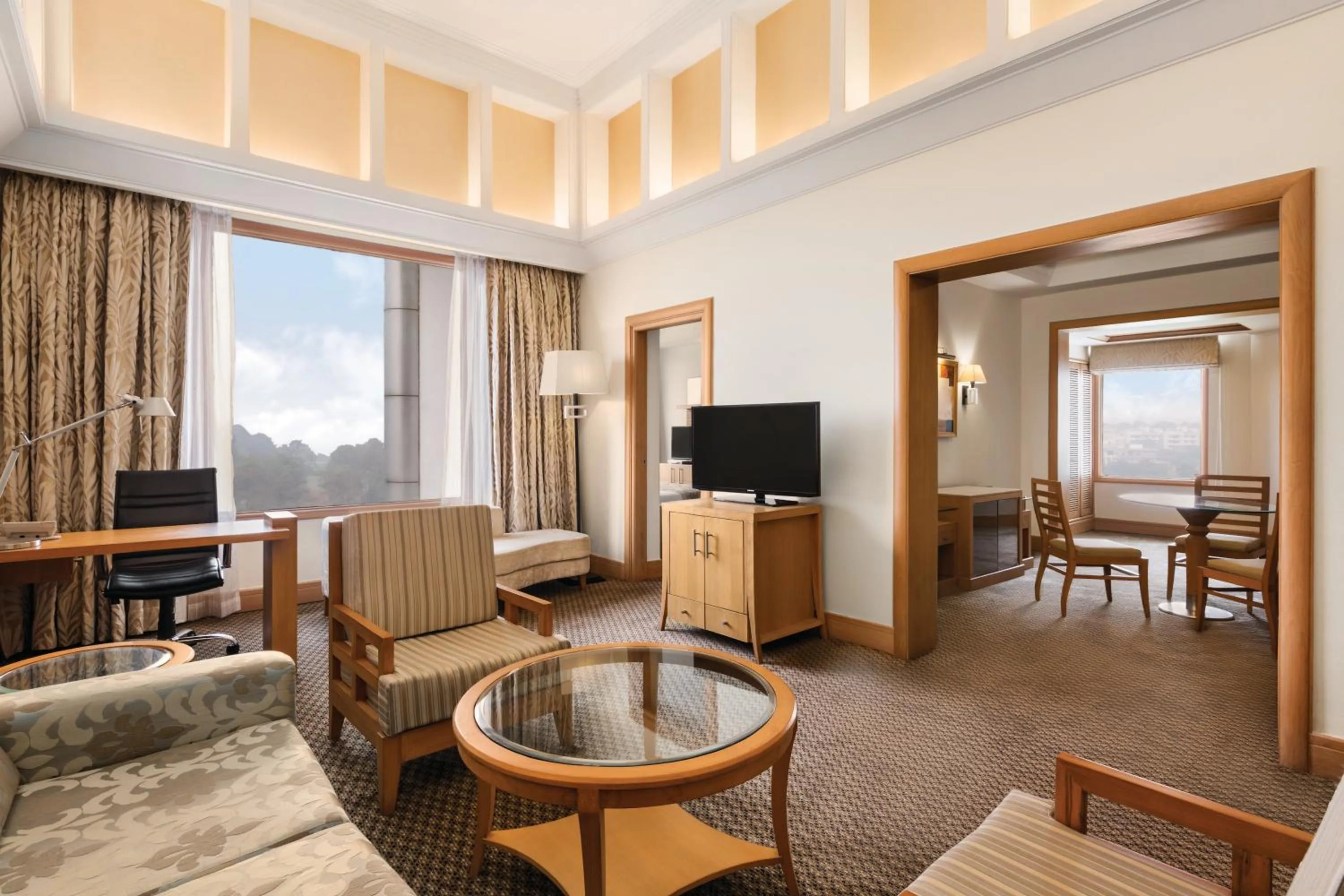 Living room in Ramada Plaza by Wyndham JHV Varanasi