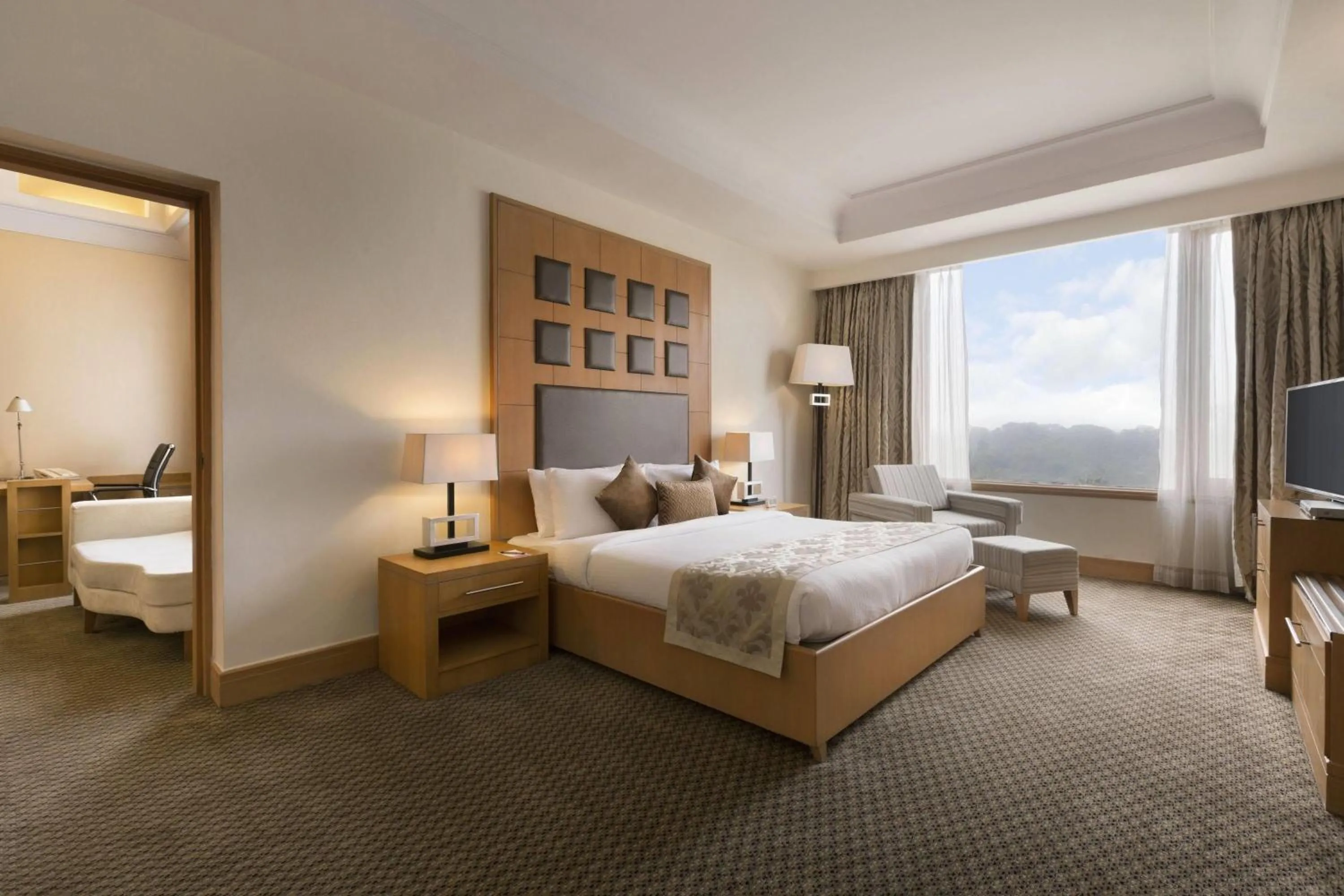 Photo of the whole room, Bed in Ramada Plaza by Wyndham JHV Varanasi