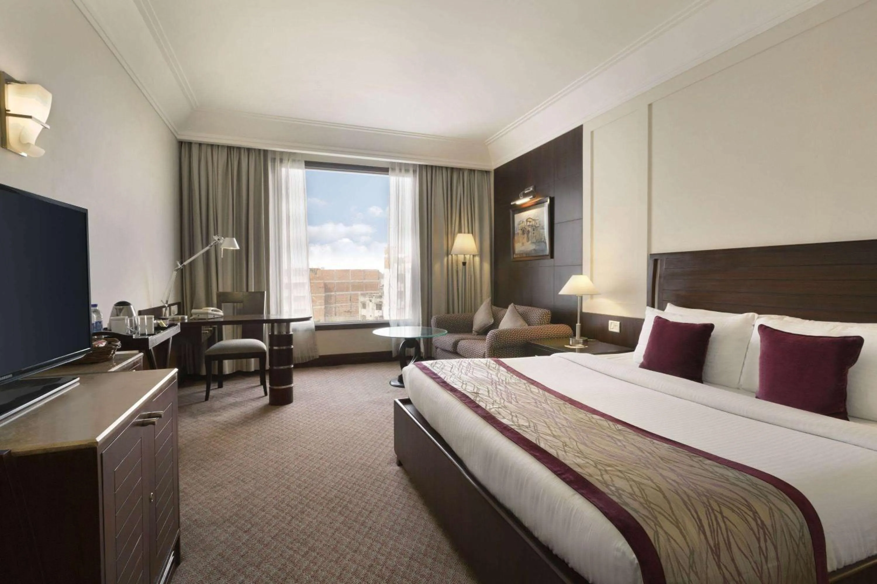 Photo of the whole room, Bed in Ramada Plaza by Wyndham JHV Varanasi