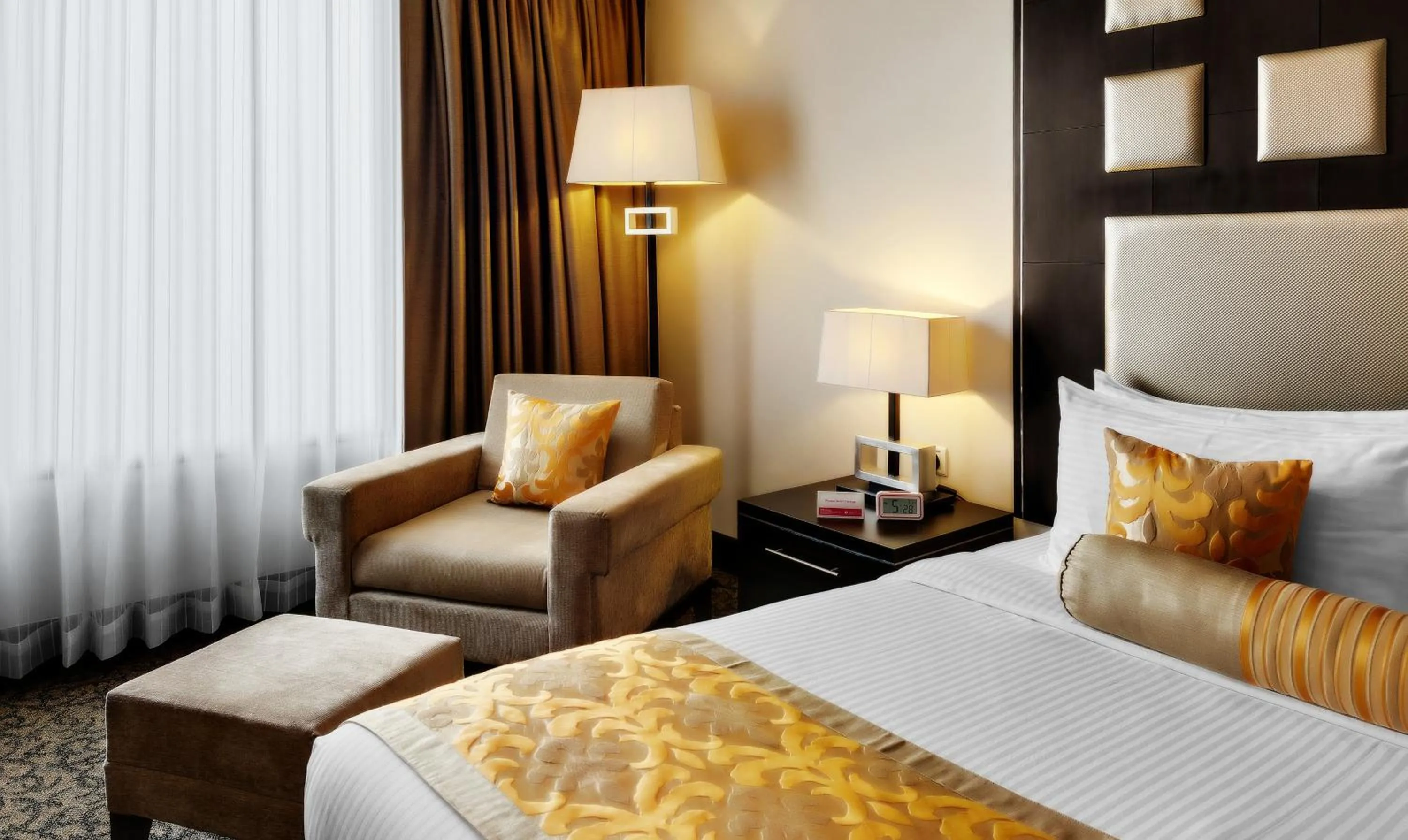 Decorative detail, Bed in Ramada Plaza by Wyndham JHV Varanasi