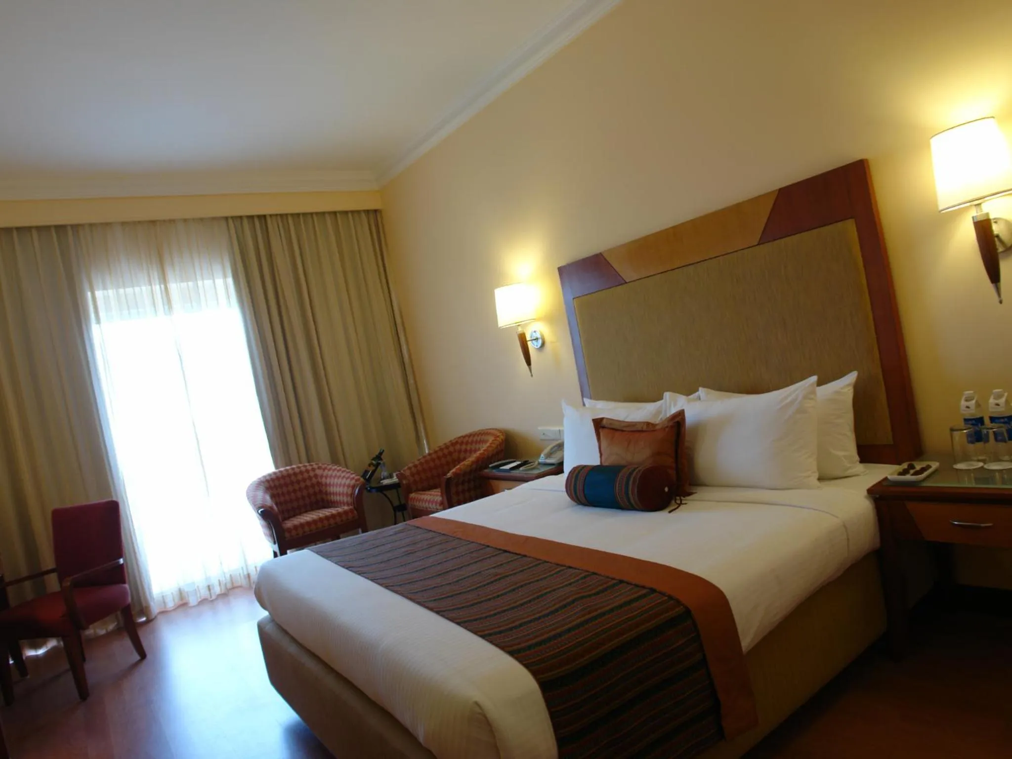 Bed in The Lalit Ashok