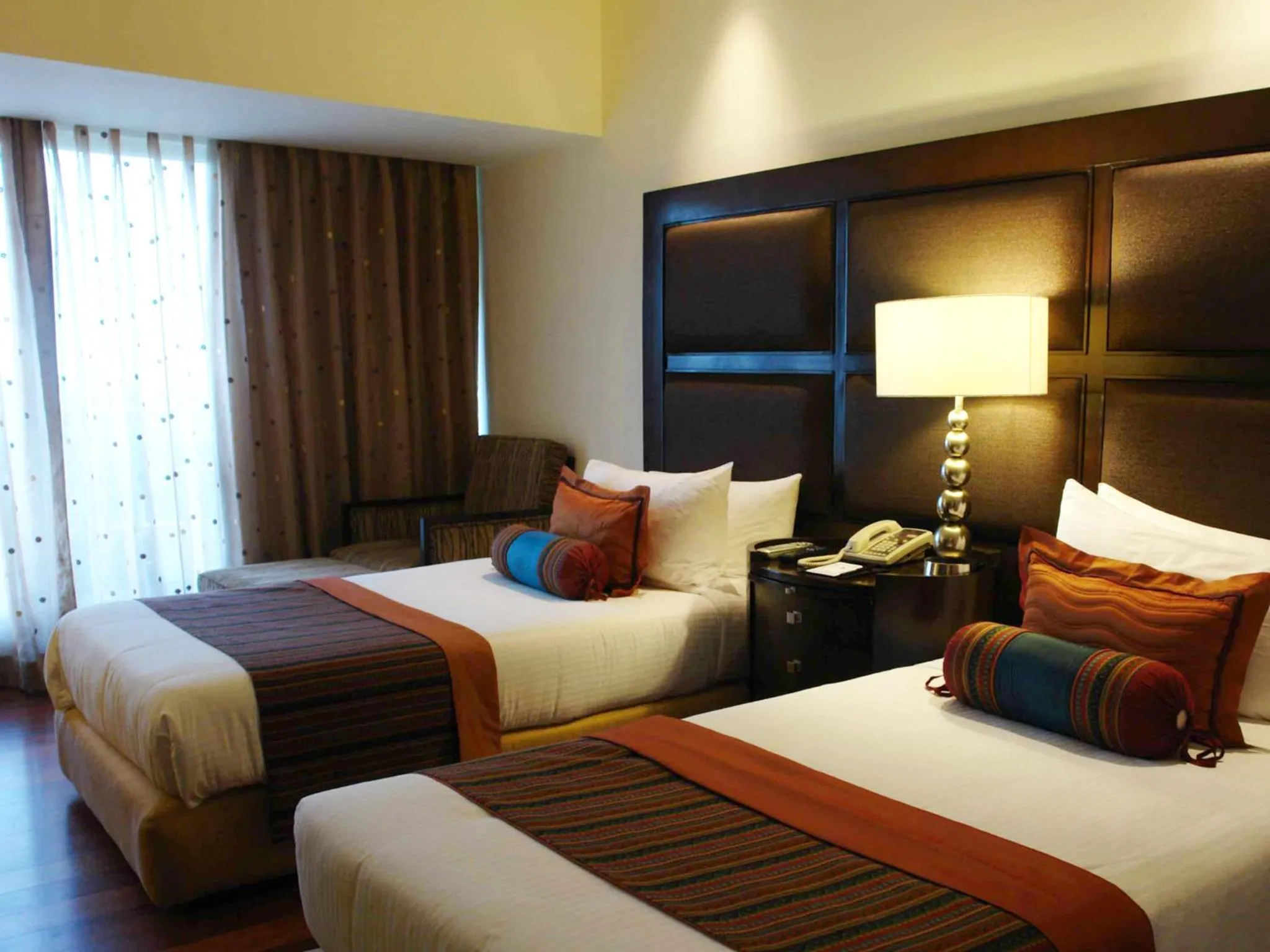 Bed in The Lalit Ashok