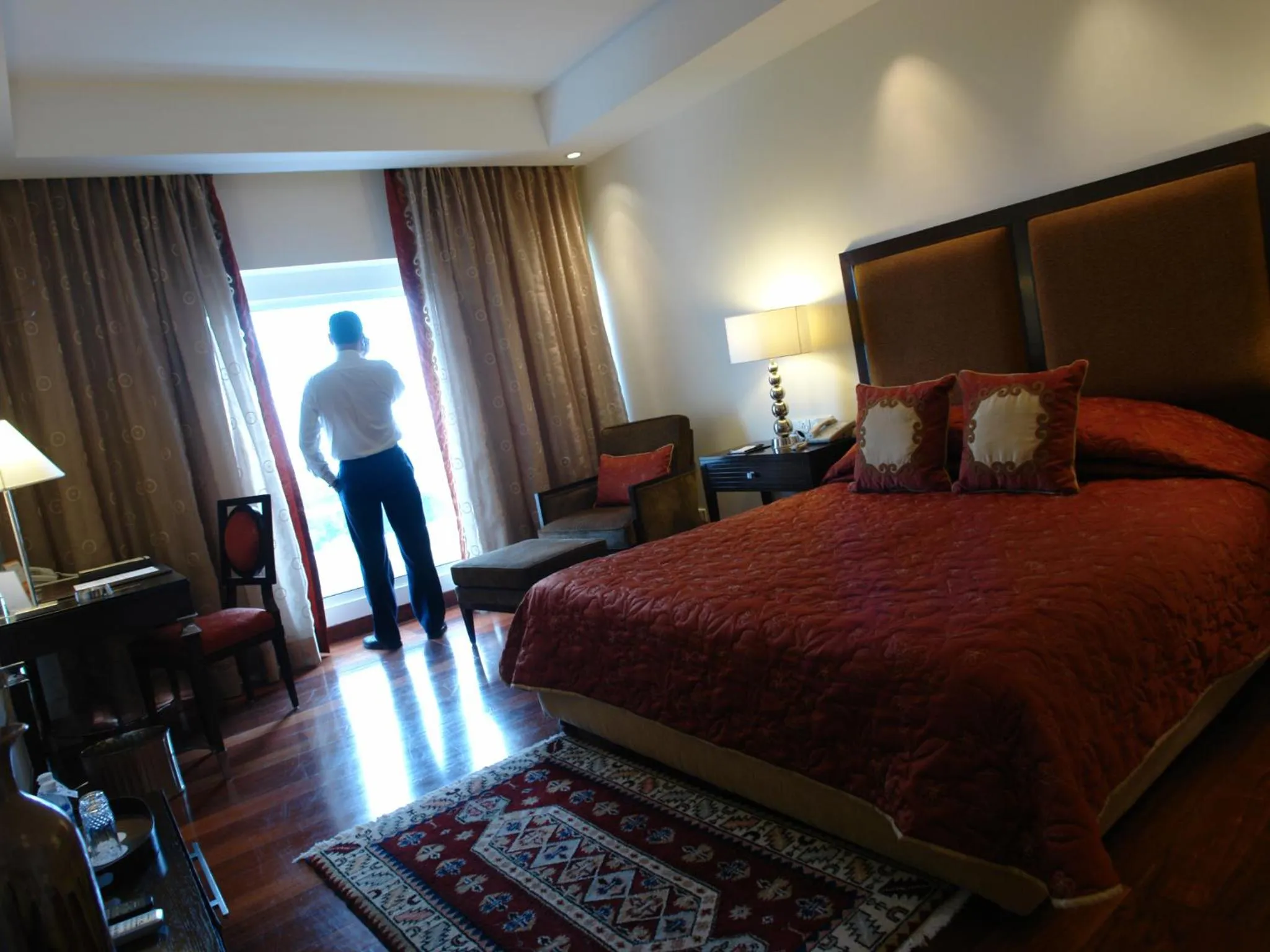 Photo of the whole room, Bed in The Lalit Ashok