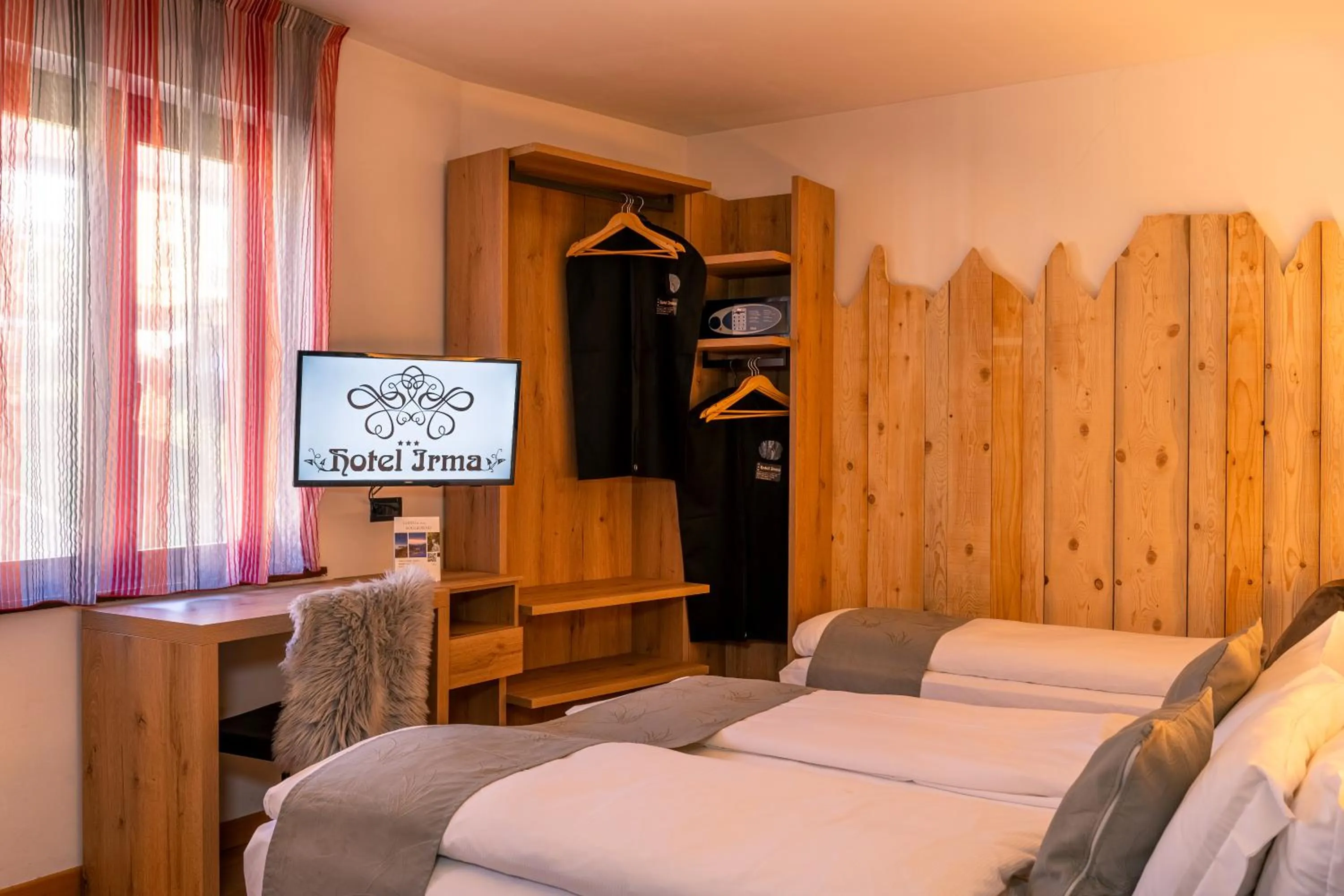 TV and multimedia, Bed in Hotel Irma