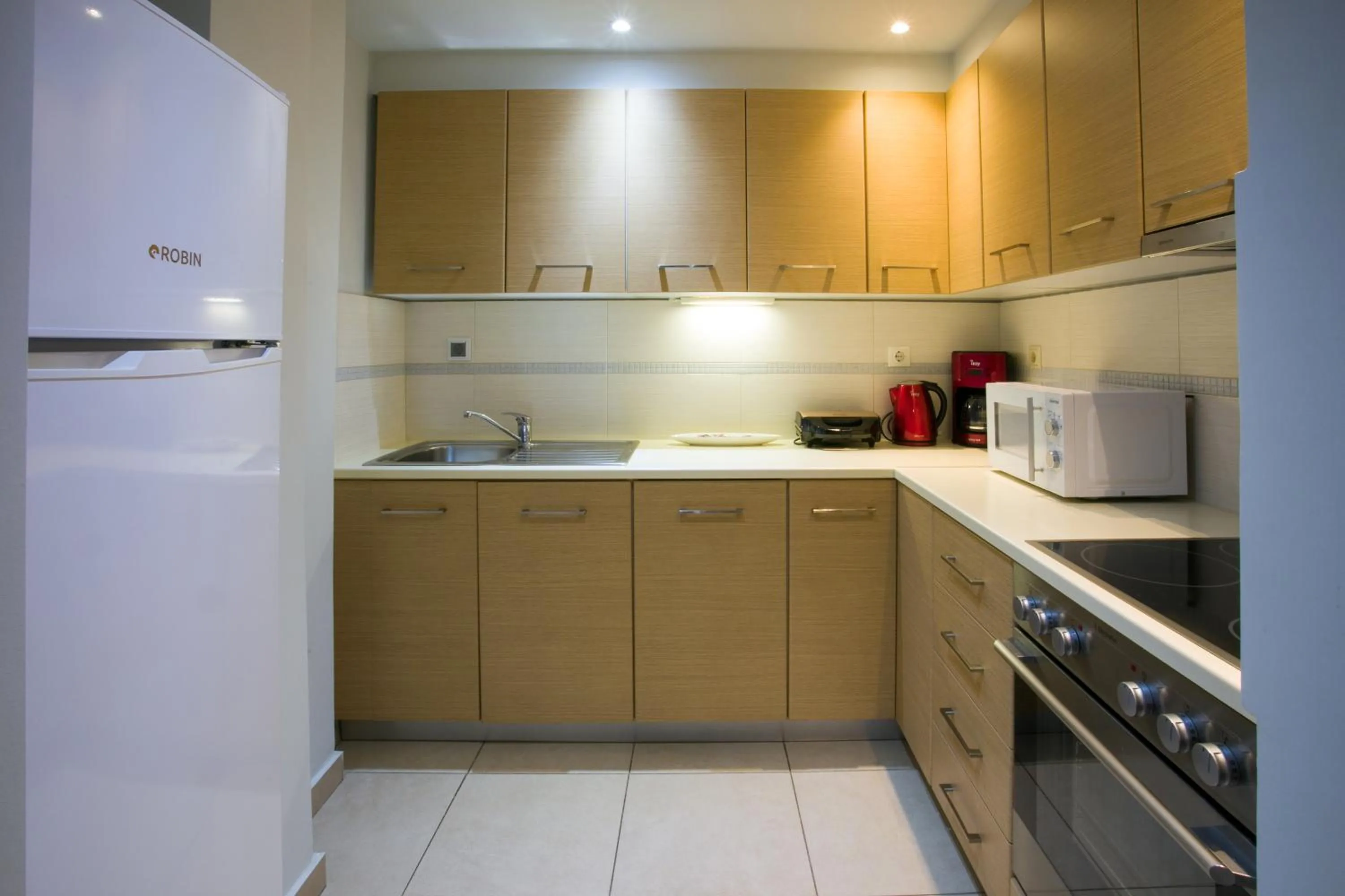 Kitchen or kitchenette in Polis Apartments