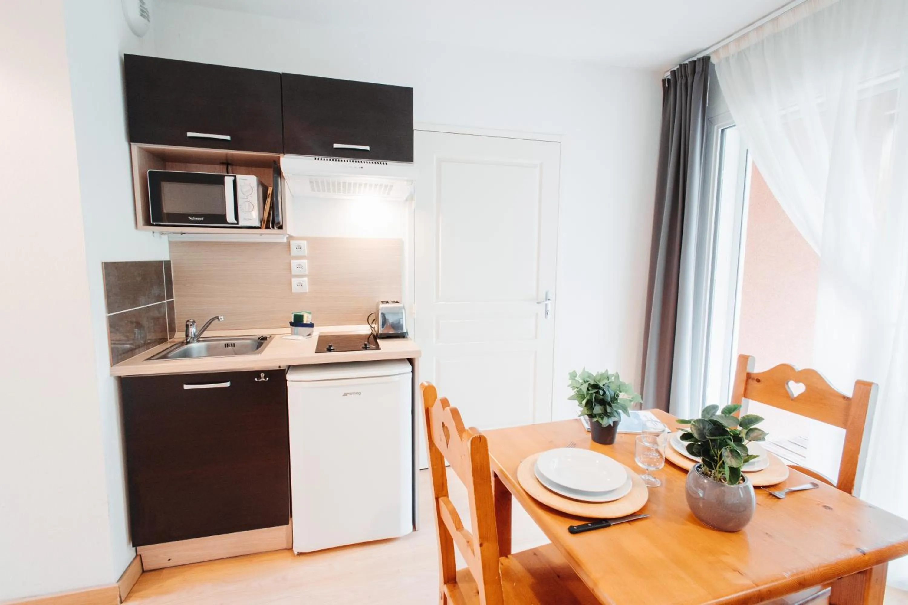 Kitchen or kitchenette in Vacancéole - Le Domaine de la Vallée d'Ax