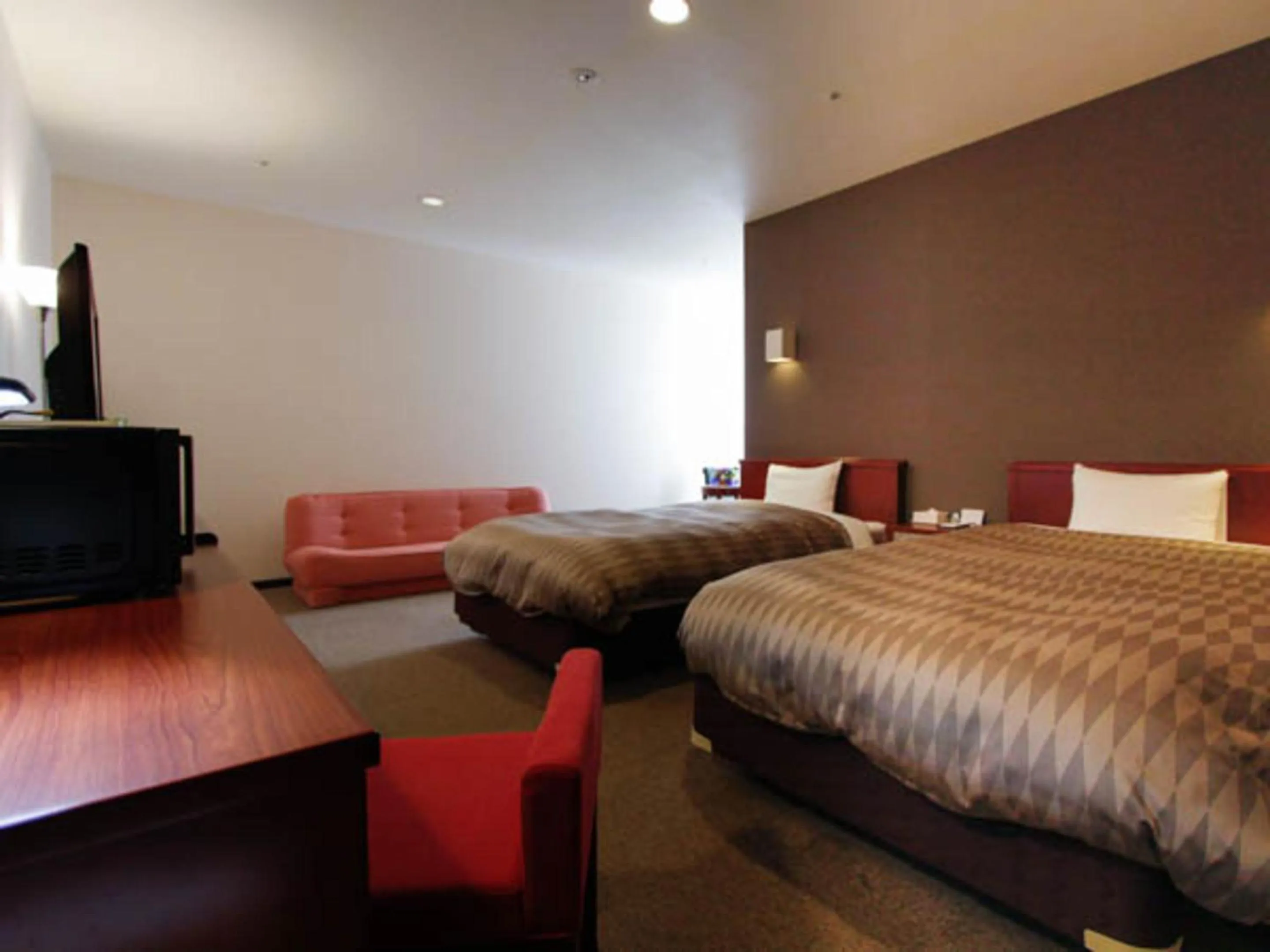 Bed in HOTEL LiVEMAX BUDGET Hamamatsu-Ekimae