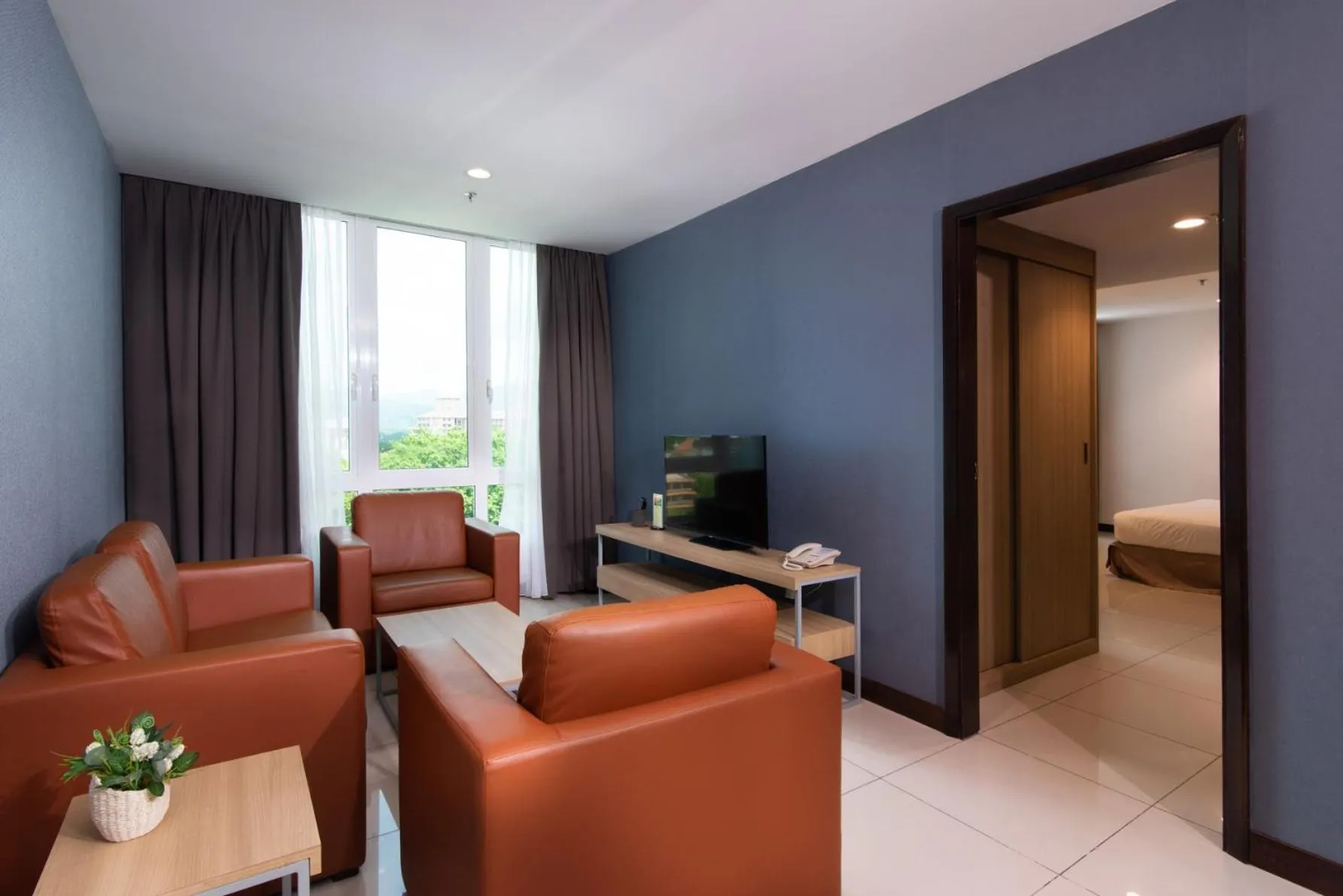 TV and multimedia in One Pacific Hotel and Serviced Apartments