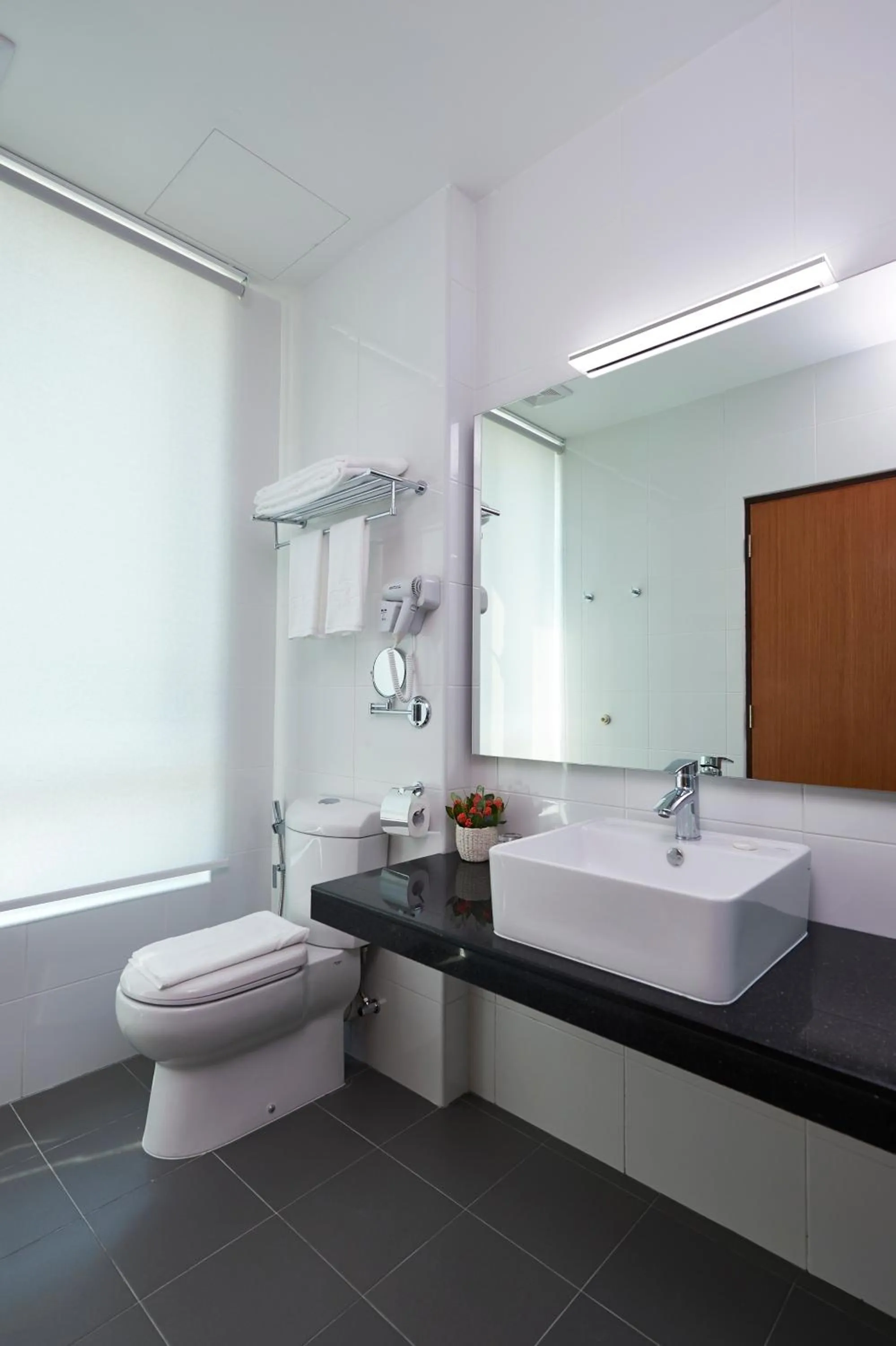 Toilet in One Pacific Hotel and Serviced Apartments