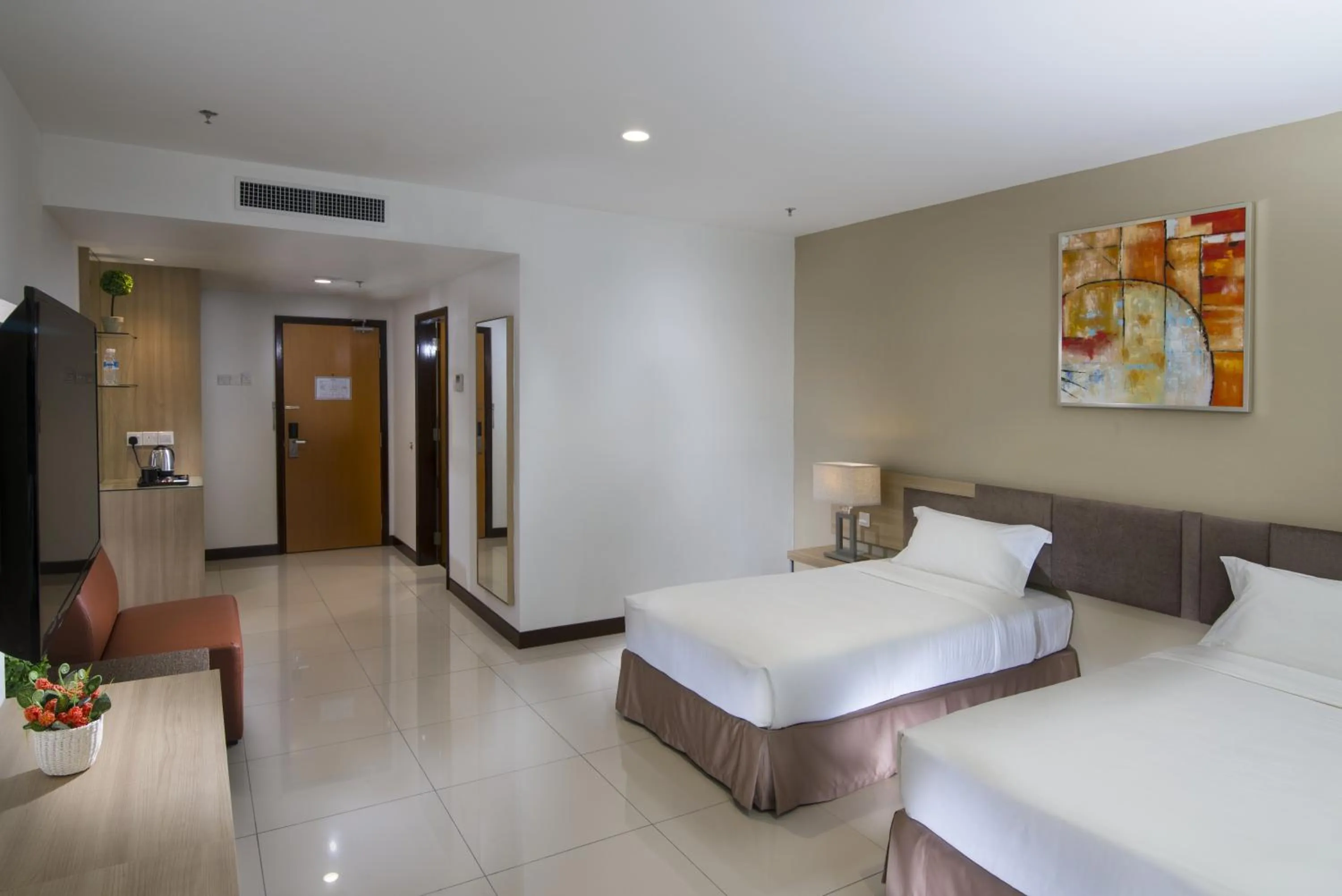 Bed in One Pacific Hotel and Serviced Apartments
