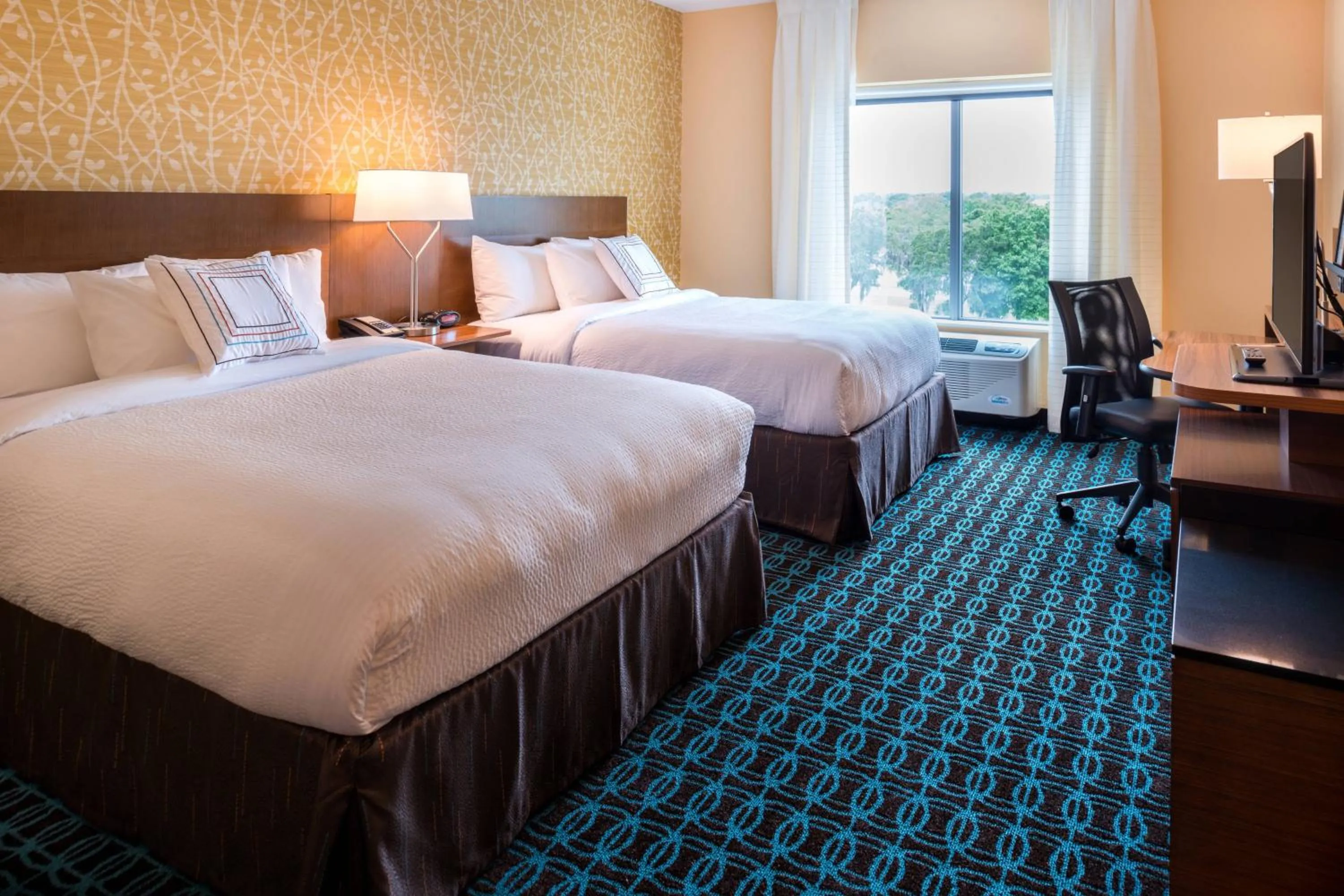 Photo of the whole room, Bed in Fairfield Inn & Suites by Marriott Orlando East/UCF Area