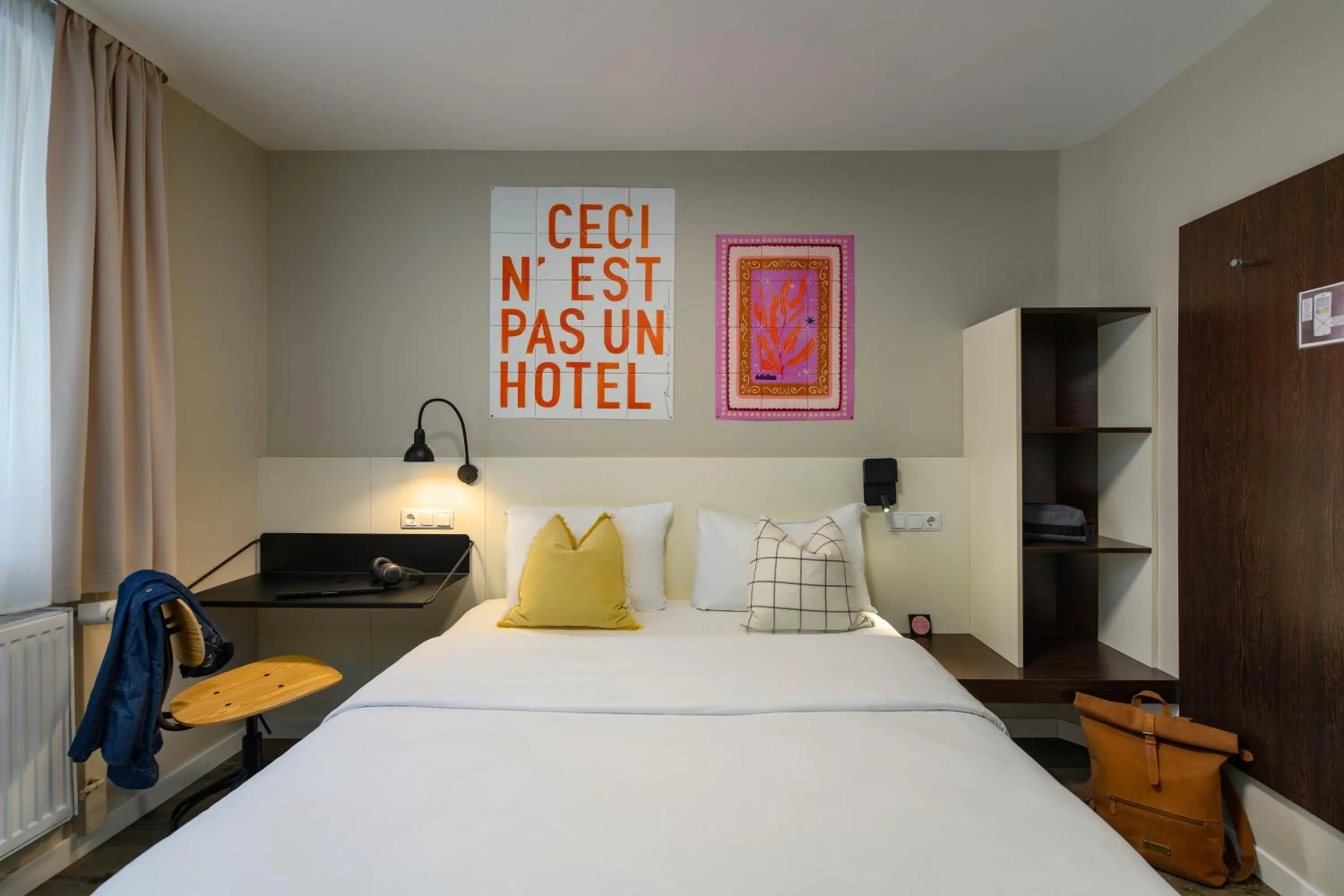 Bed in SleepinRoomz Boutique Hotel