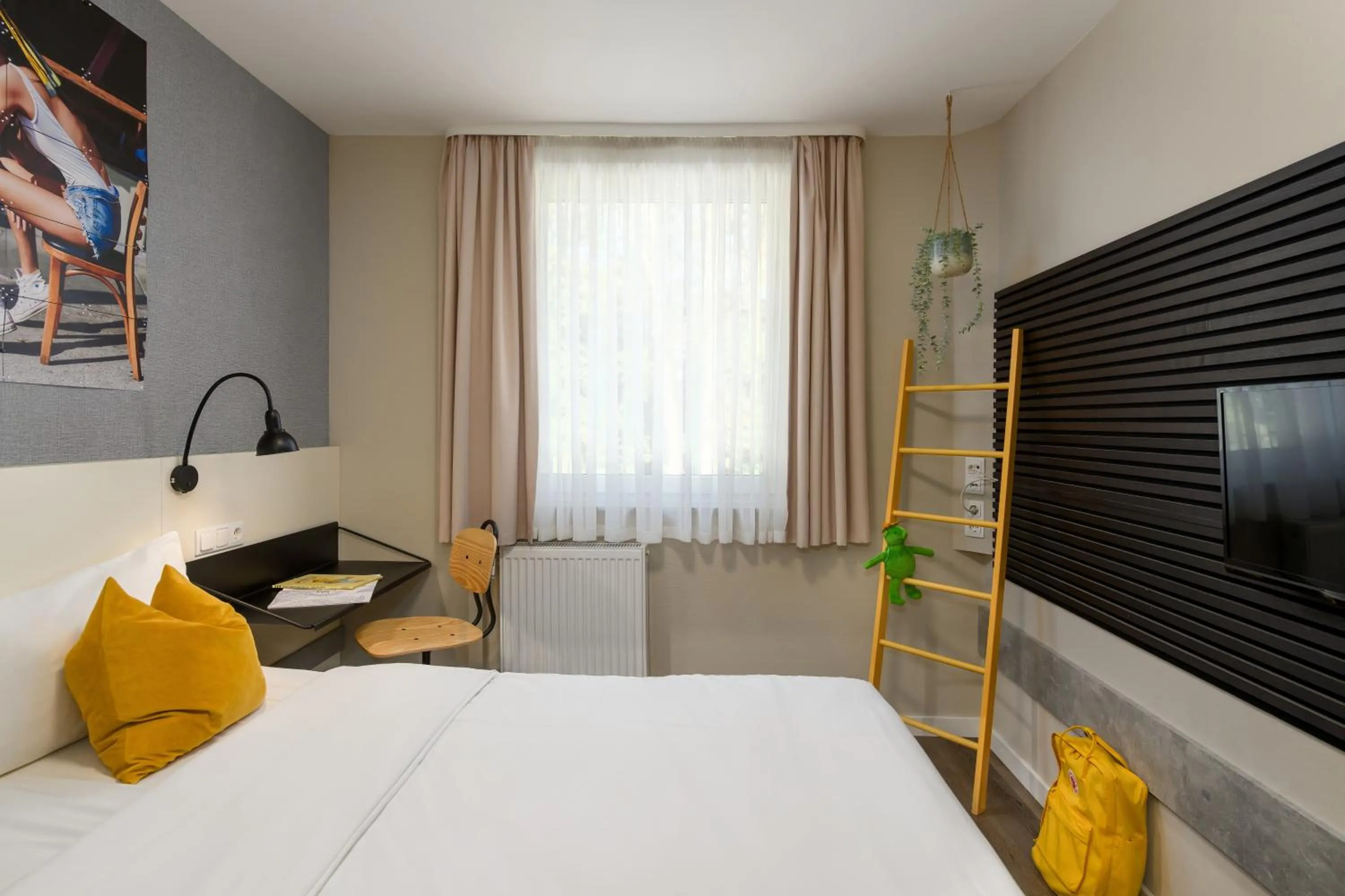 Bed in SleepinRoomz Boutique Hotel