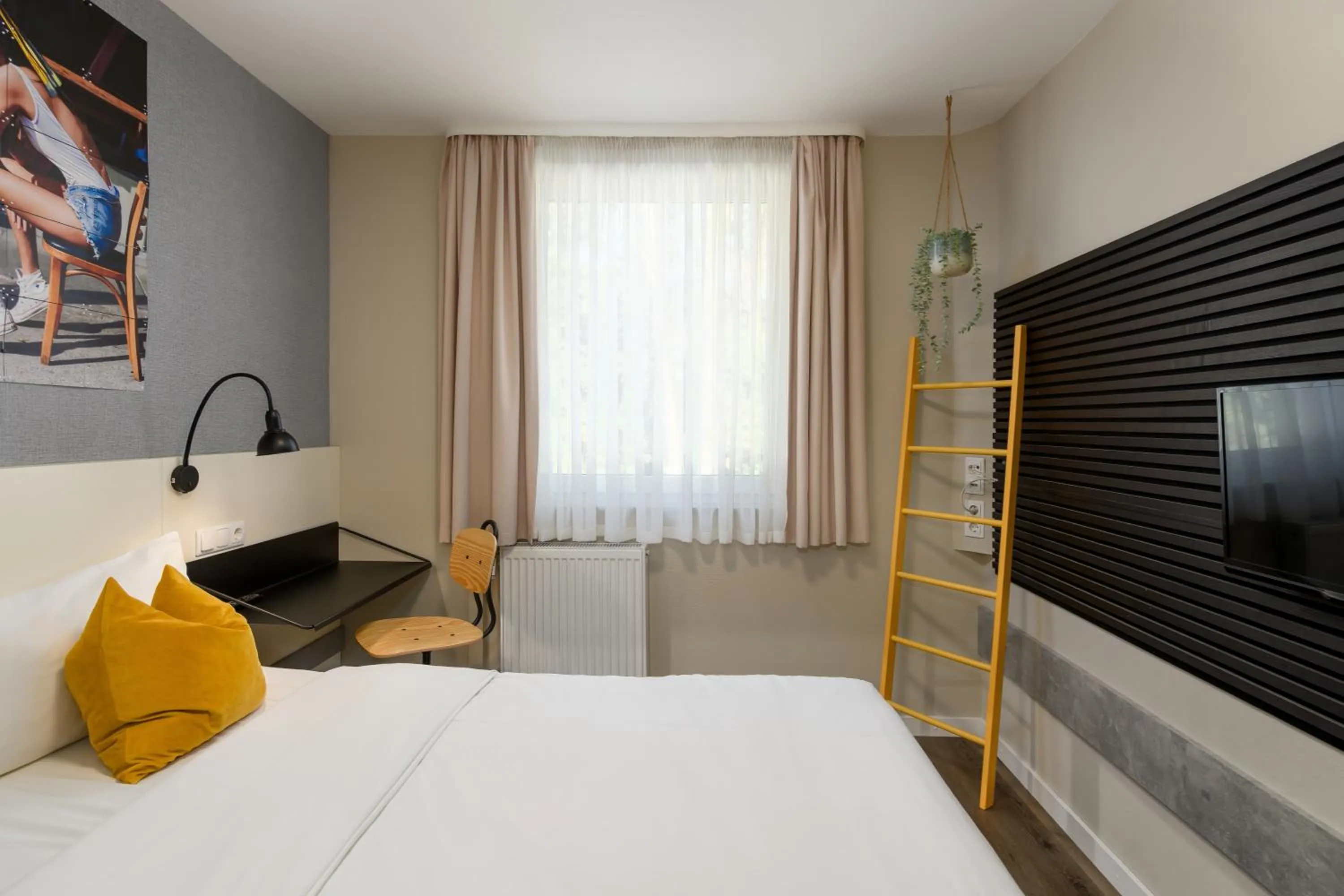 Bed in SleepinRoomz Boutique Hotel