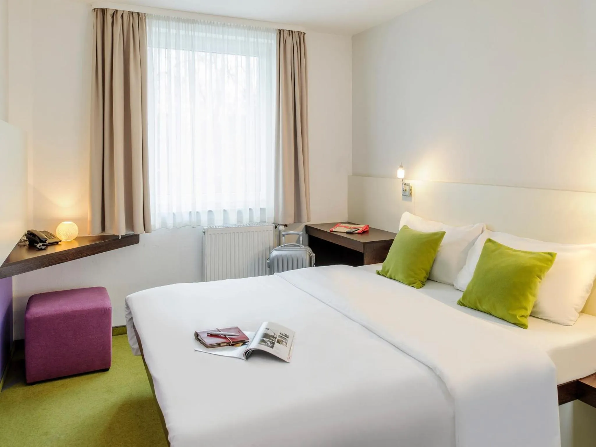 Bed in SleepinRoomz Boutique Hotel