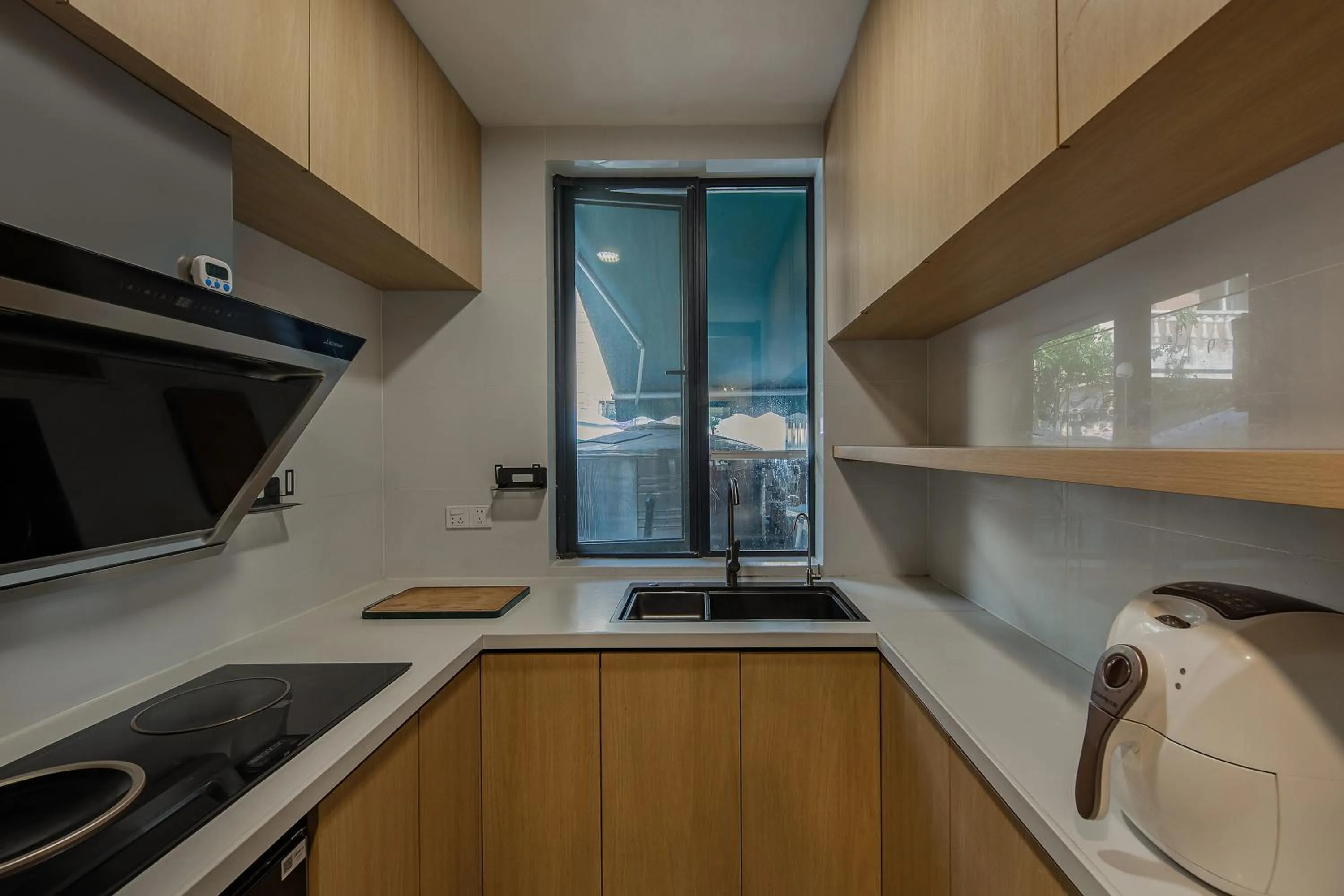 Kitchen or kitchenette in T innn - West Lake - Yueshang Yunshe Homestay - Hangzhou Taiziwan Park Branch