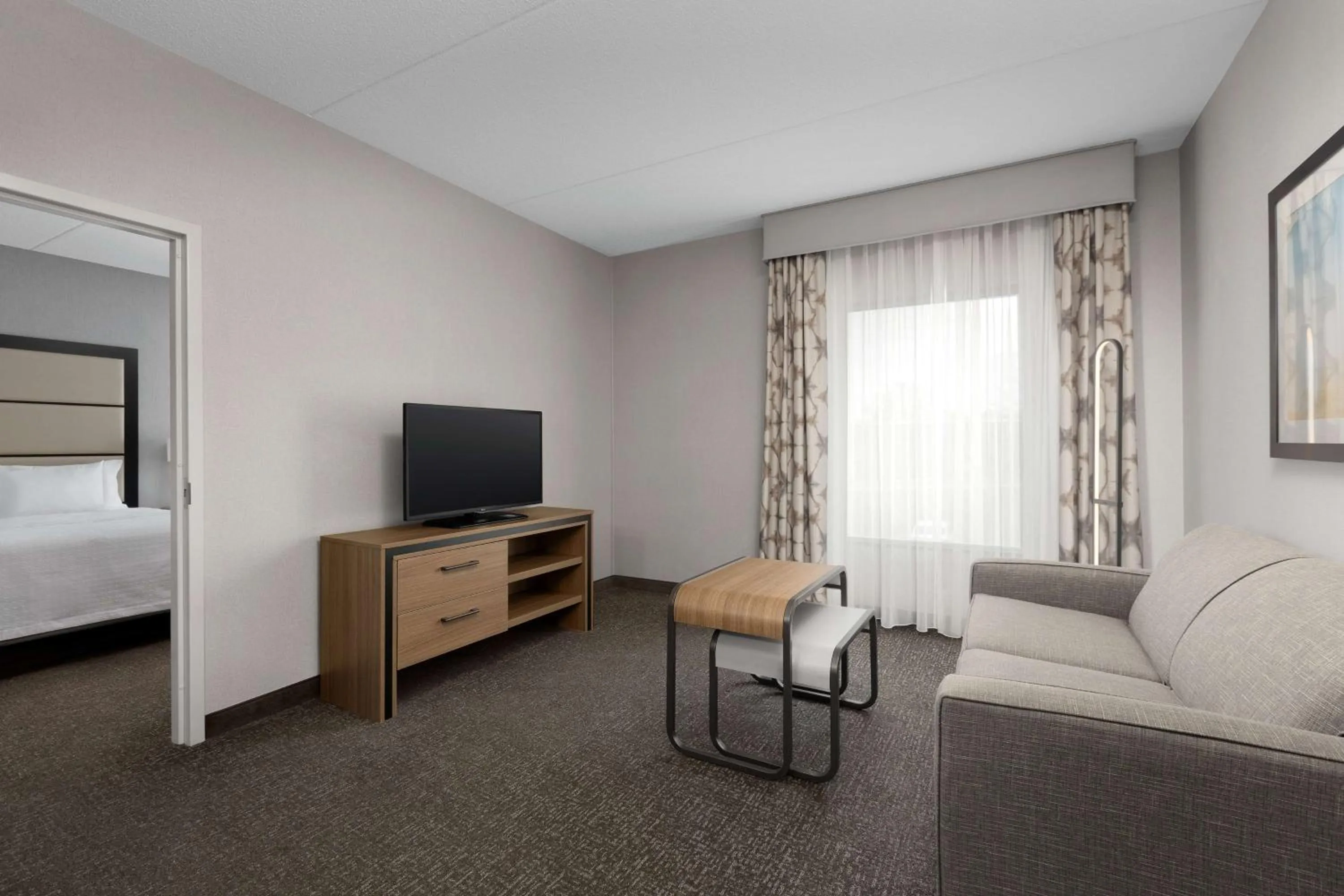 Living room, Bed in Homewood Suites by Hilton York