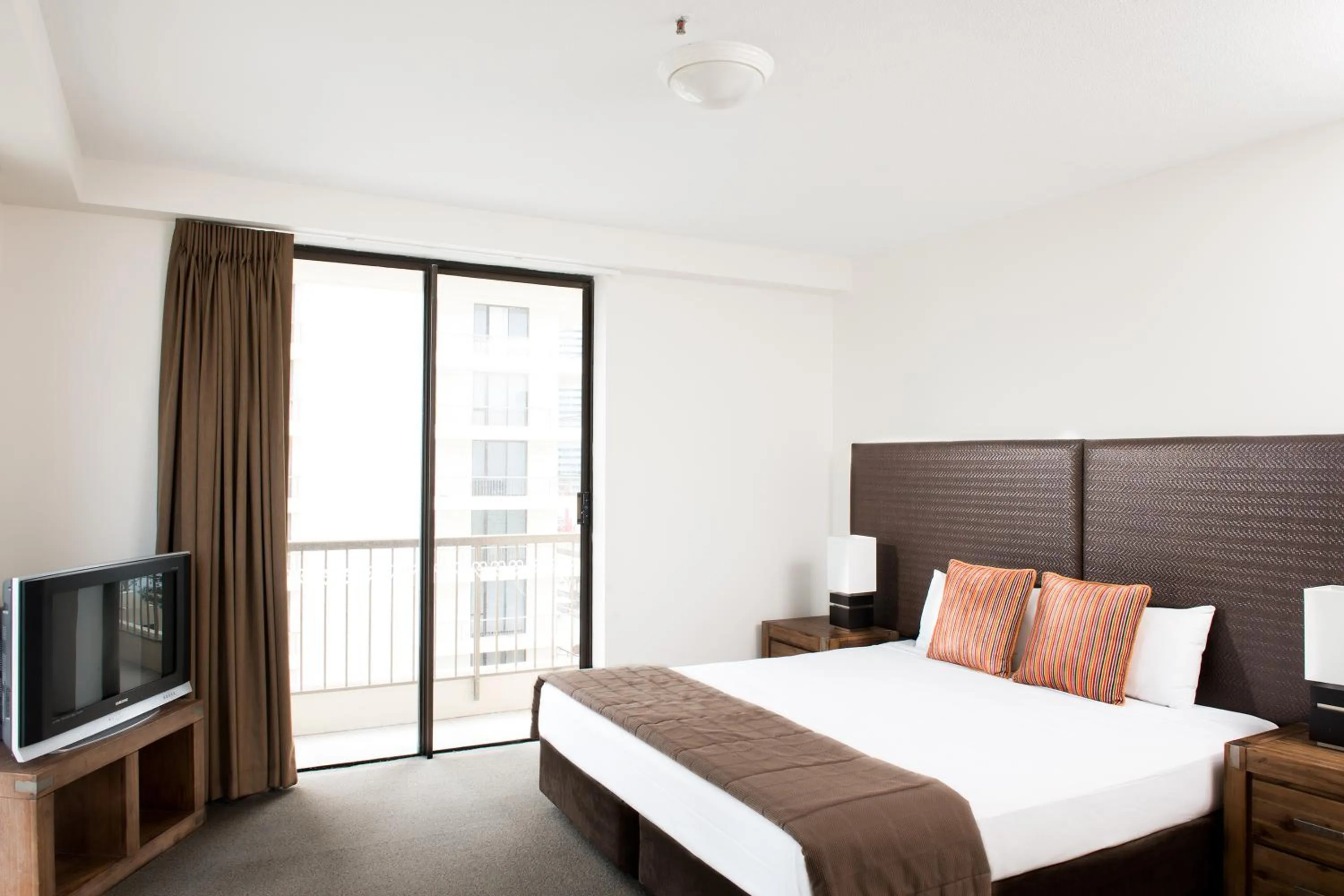 Bedroom, Bed in Paradise Centre Apartments