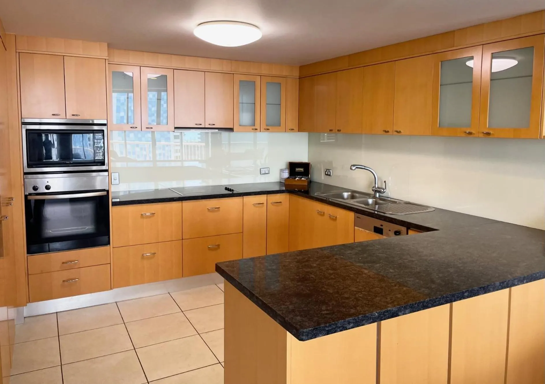 Kitchen or kitchenette in Bel Air on Broadbeach - Official