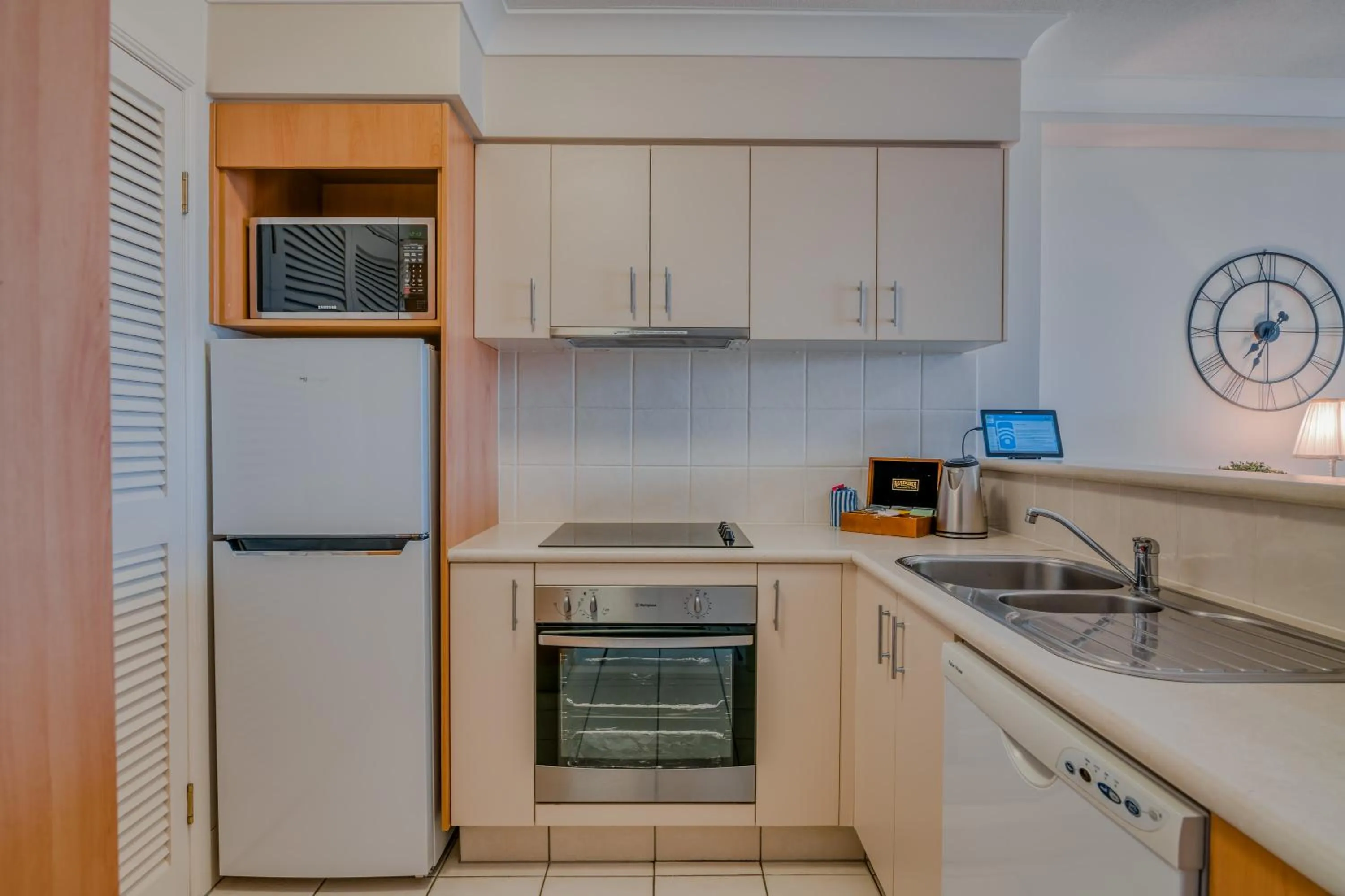 Kitchen or kitchenette in Bel Air on Broadbeach - Official