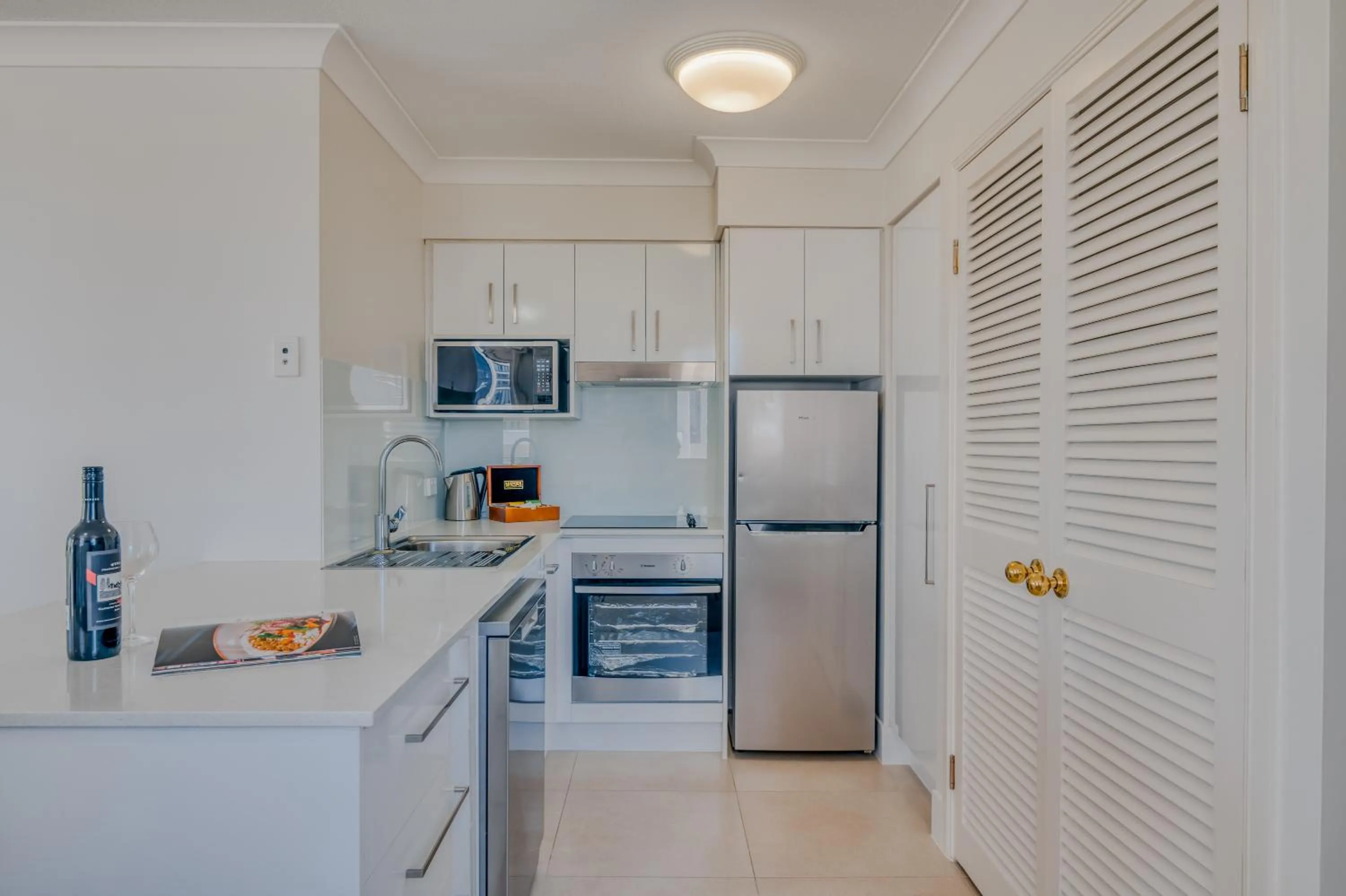Kitchen or kitchenette in Bel Air on Broadbeach - Official