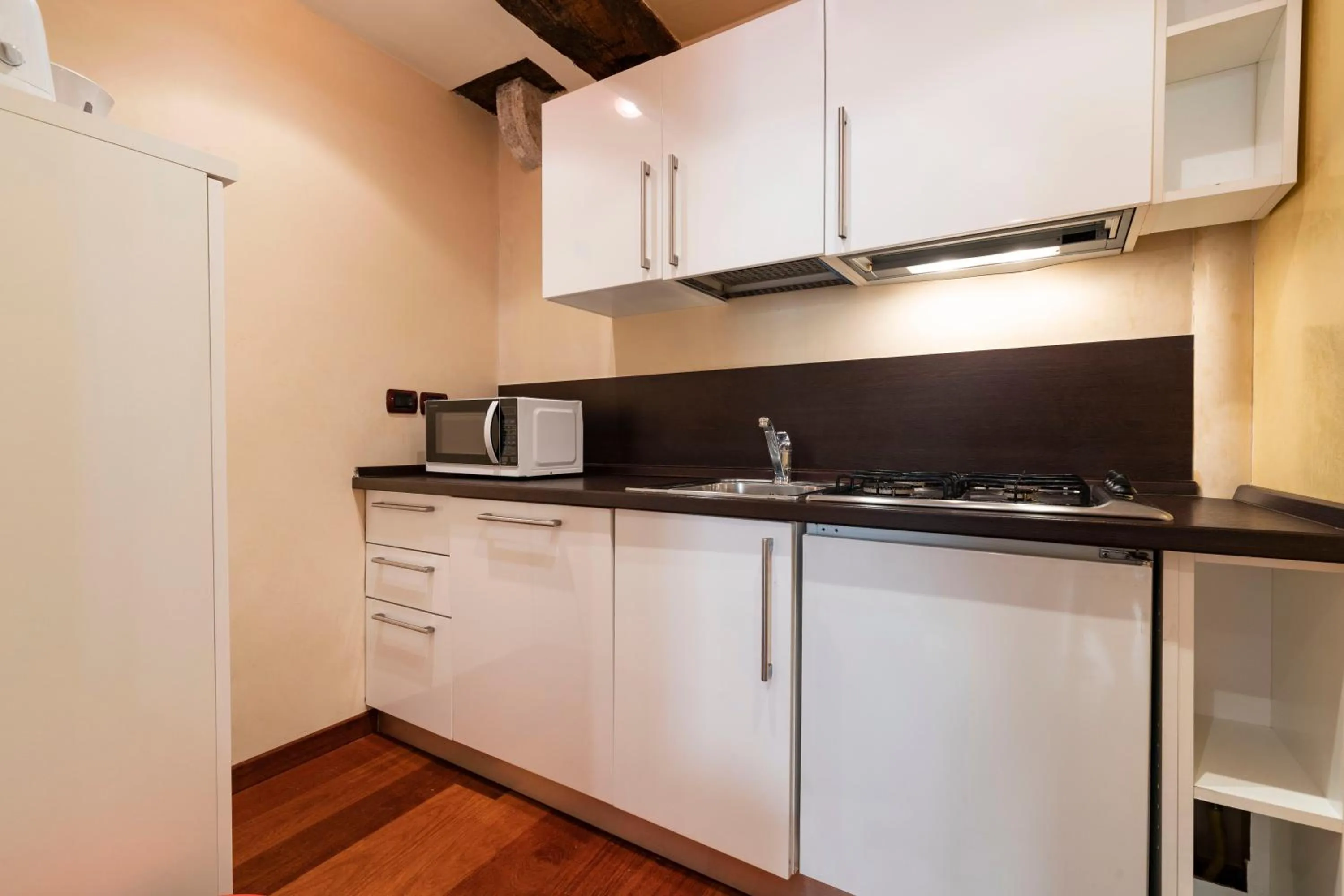 Kitchen or kitchenette in Doge Morosini Palace by Wonderful Italy