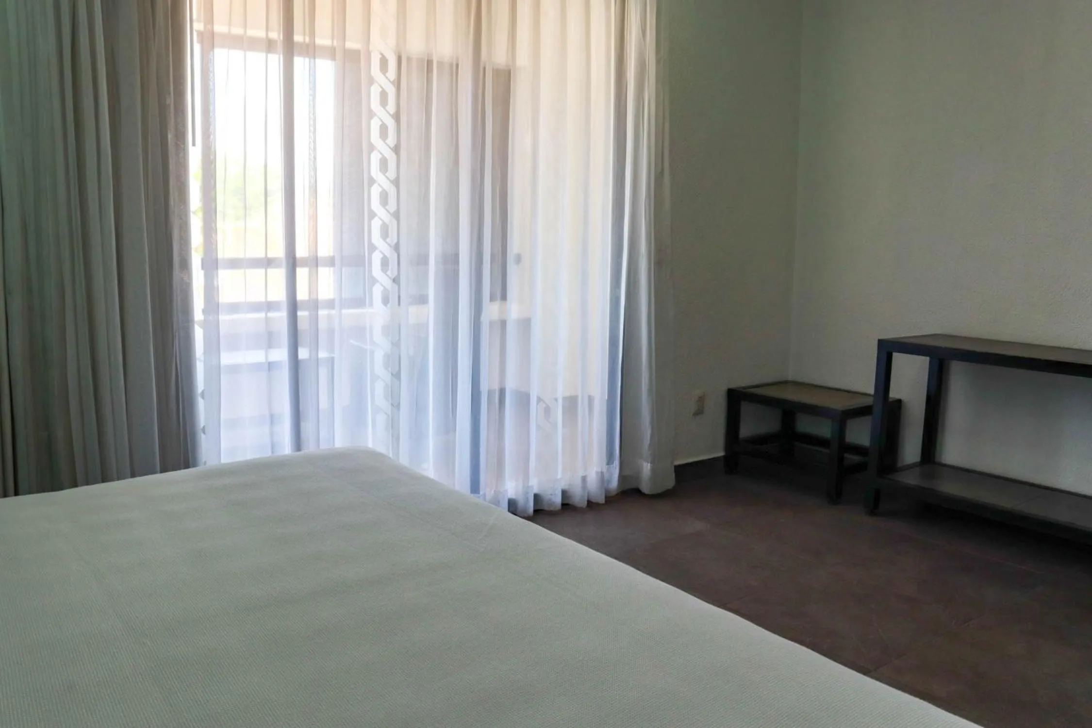 Photo of the whole room, Bed in Hotel MX portal maya