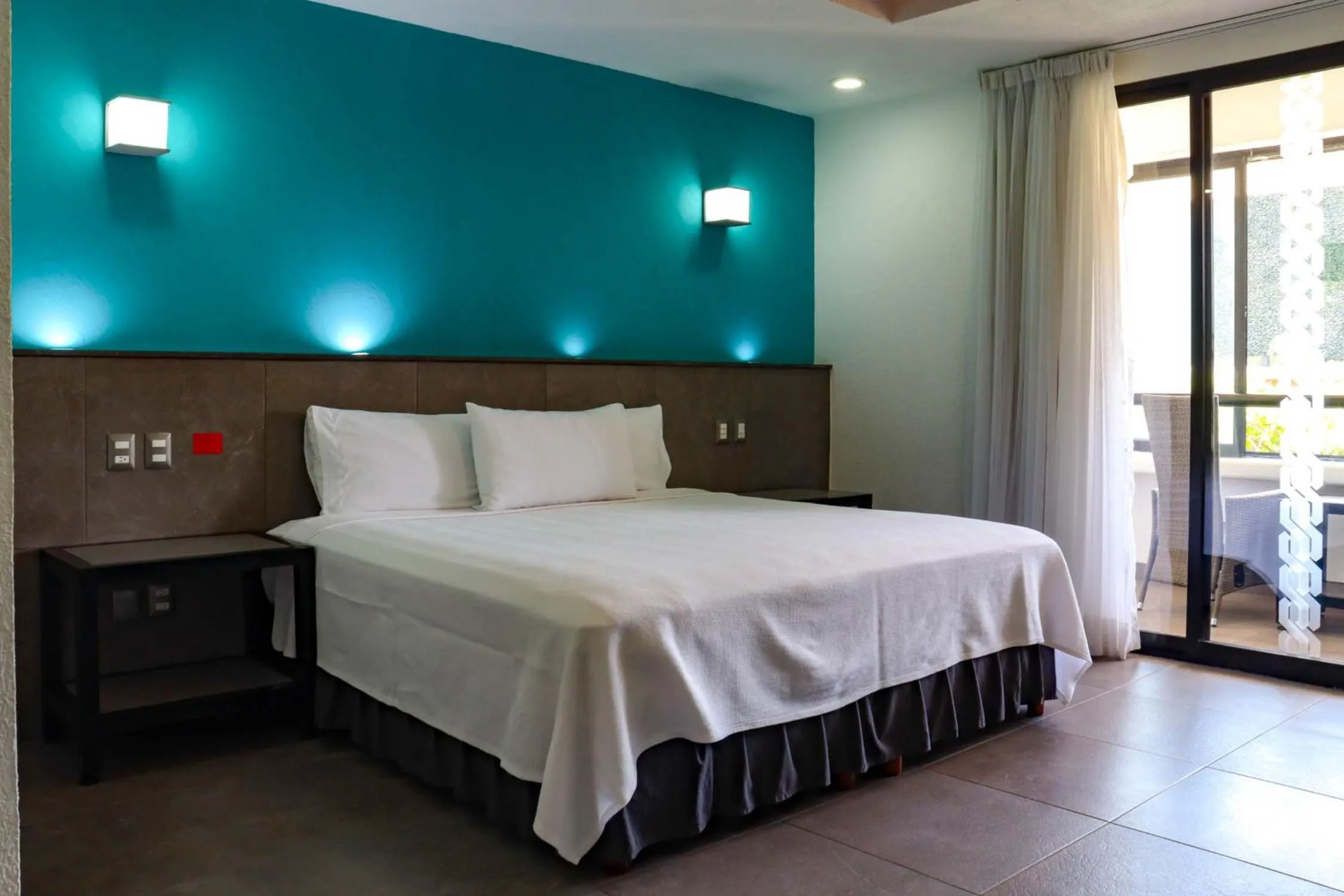 Photo of the whole room, Bed in Hotel MX portal maya