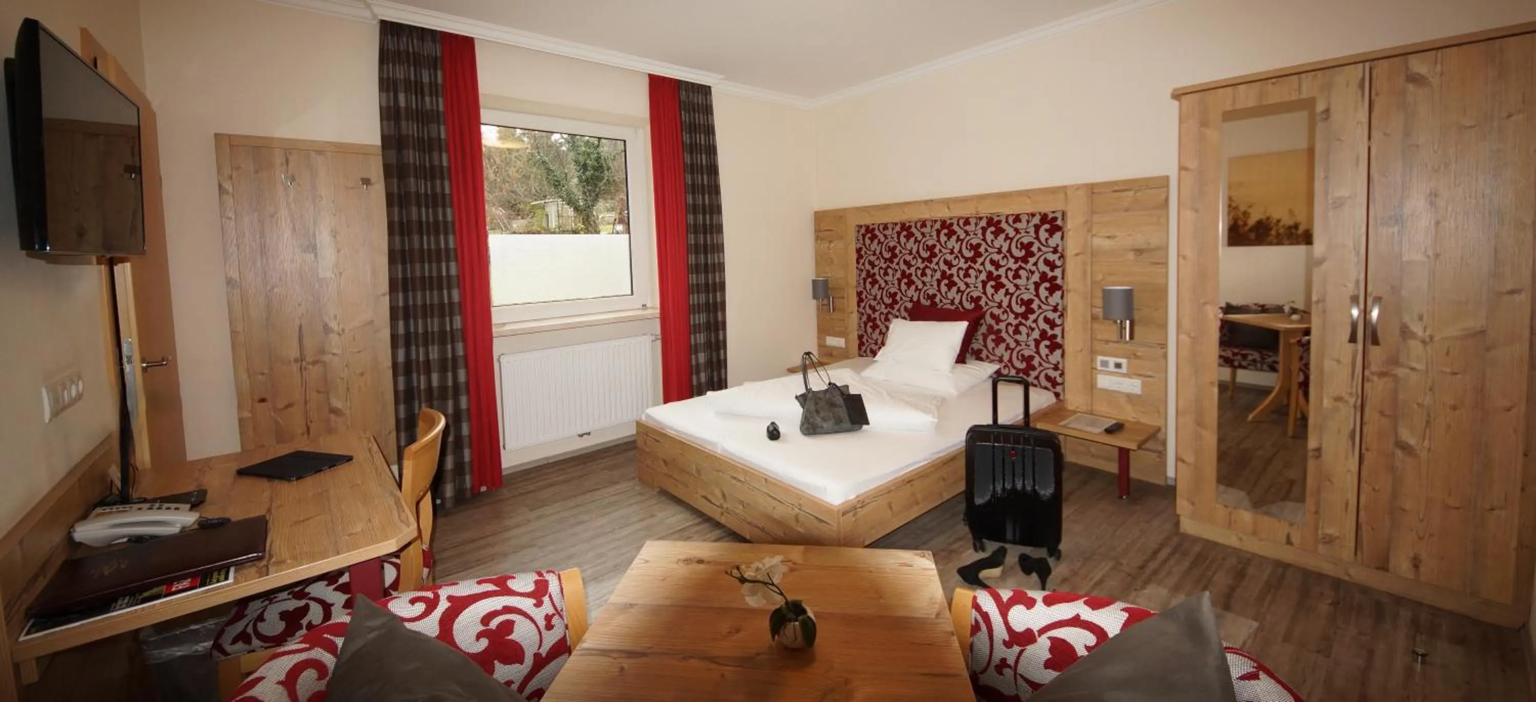 Photo of the whole room, Bed in Der Marienhof Hotel Garni