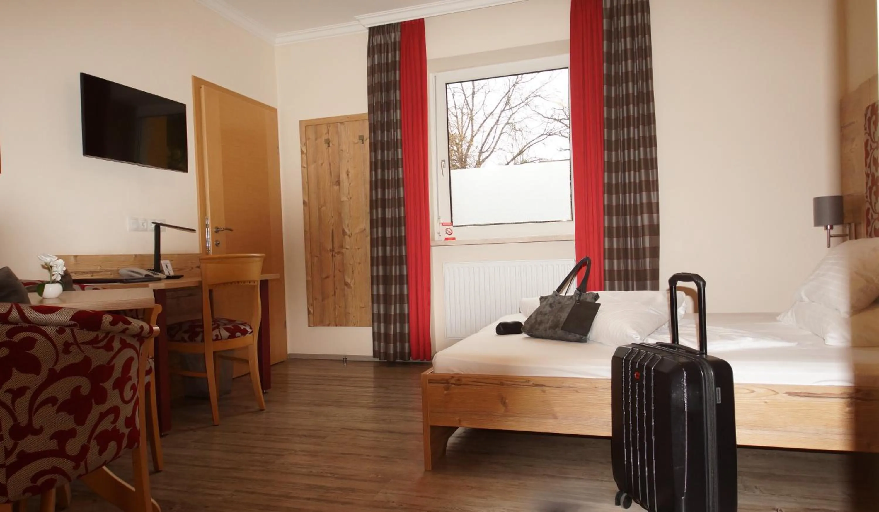 Photo of the whole room, Bed in Der Marienhof Hotel Garni