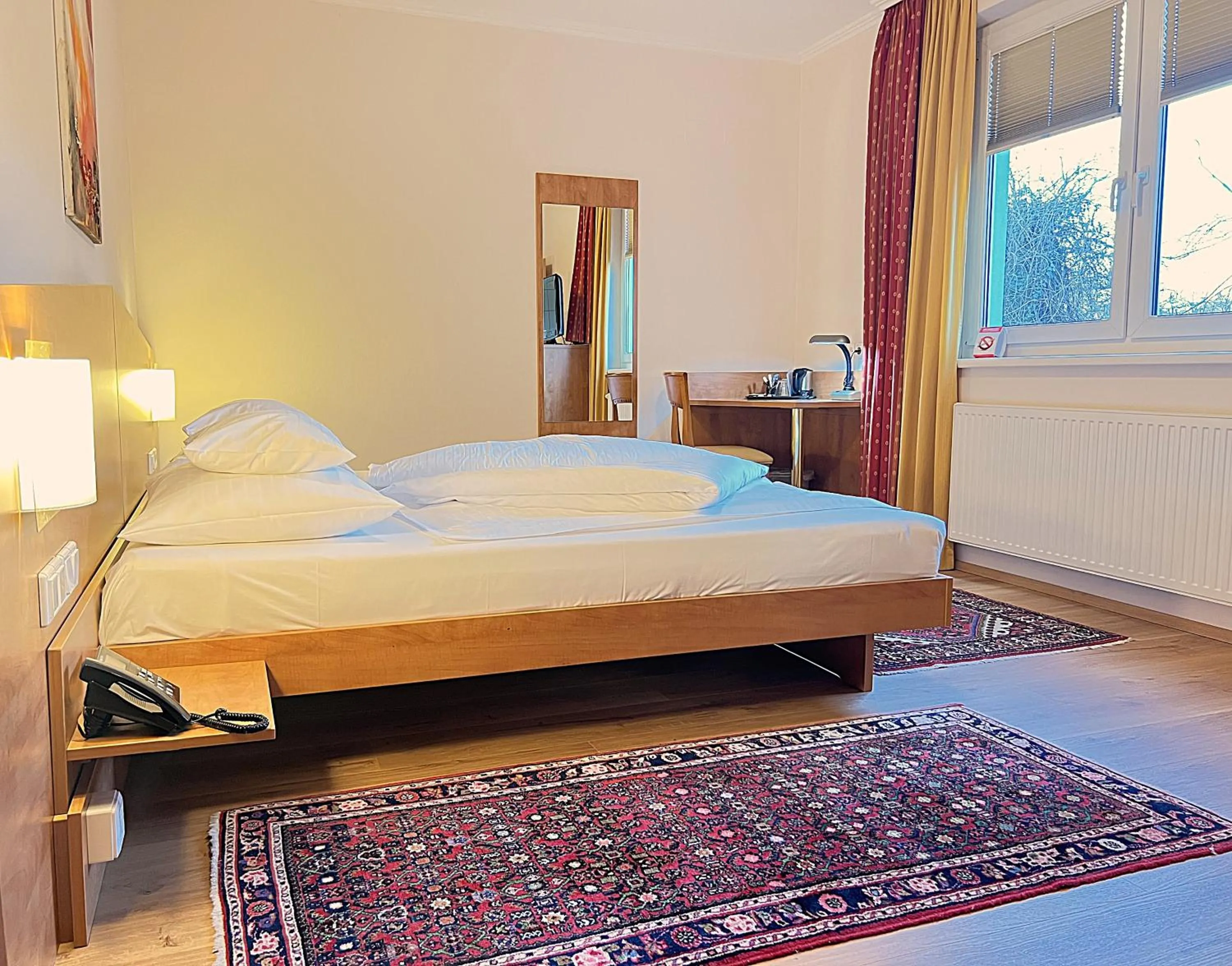 Photo of the whole room, Bed in Der Marienhof Hotel Garni