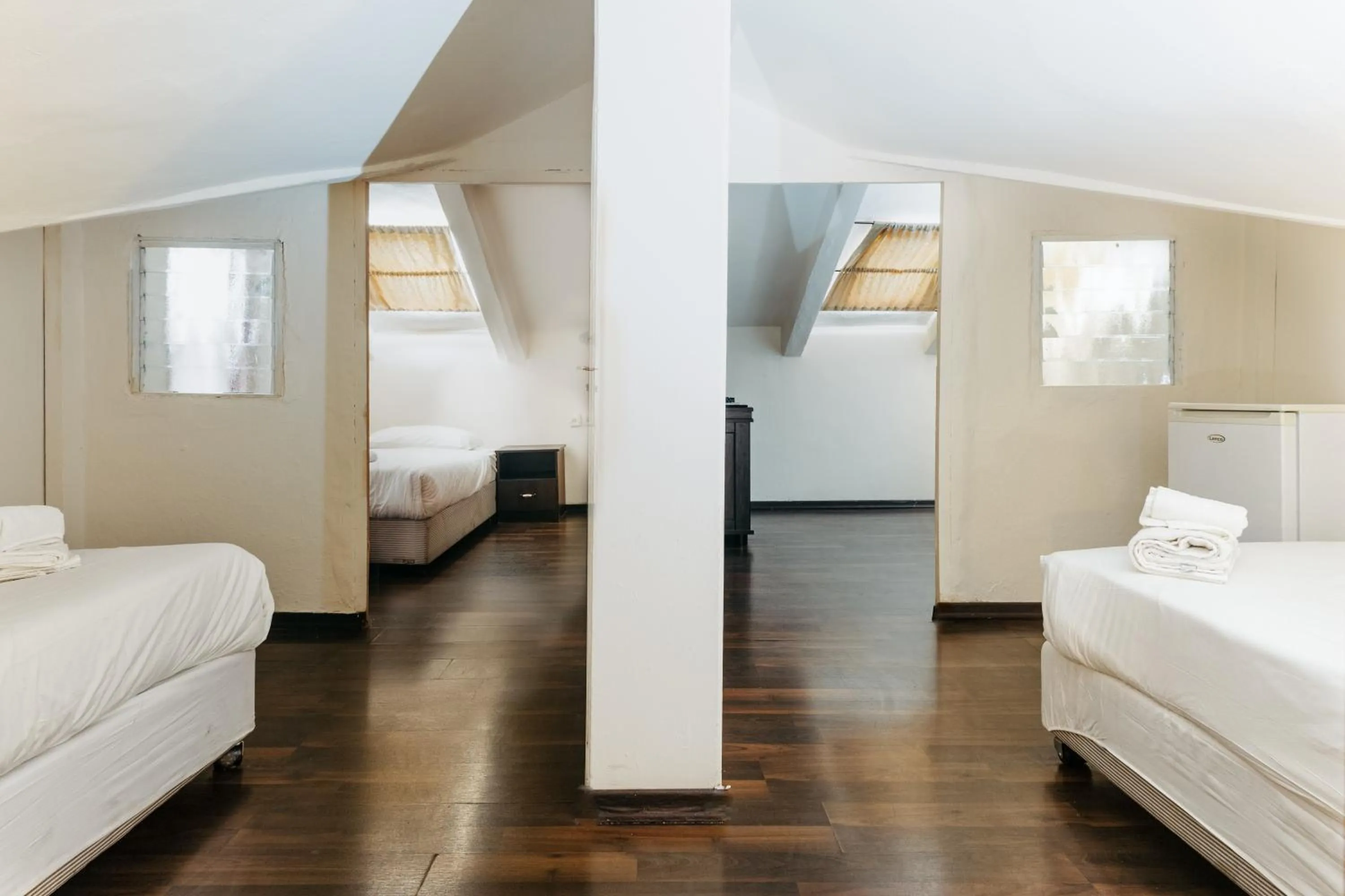 Bed in The Colony Hotel