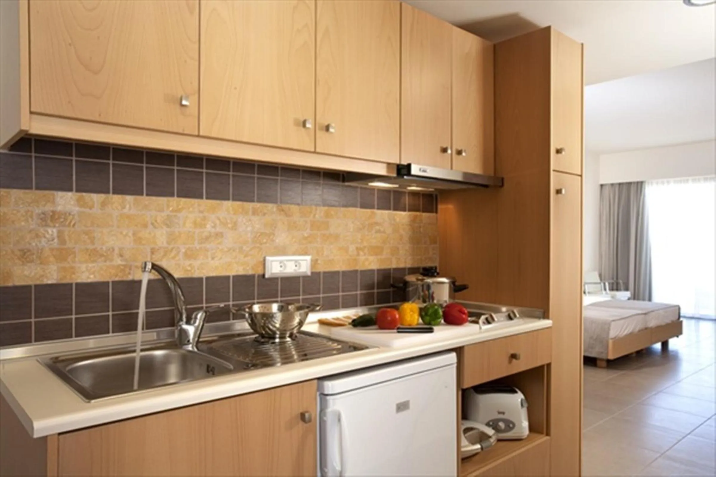 Kitchen or kitchenette in Island Blue Hotel