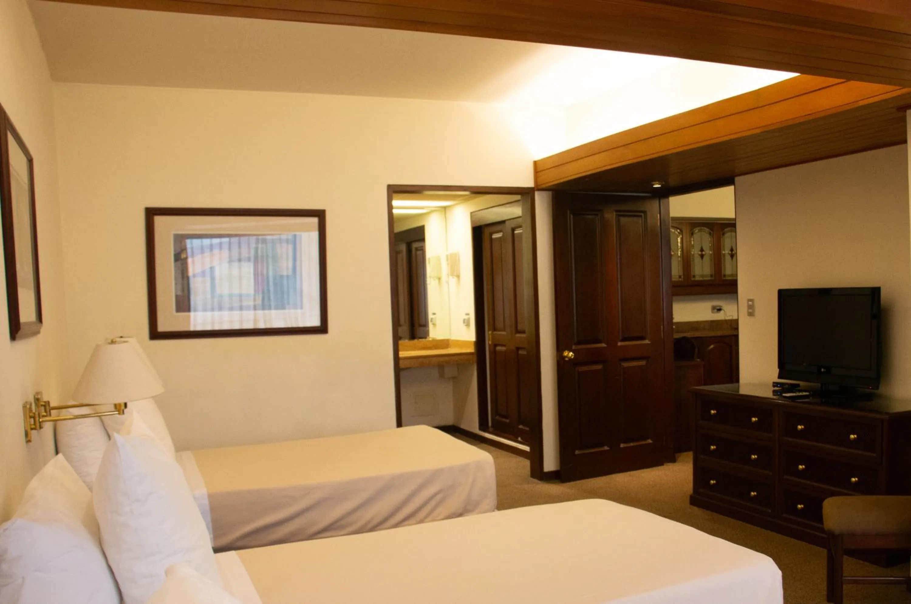 Seating area, Bed in J&A Classic Hotel