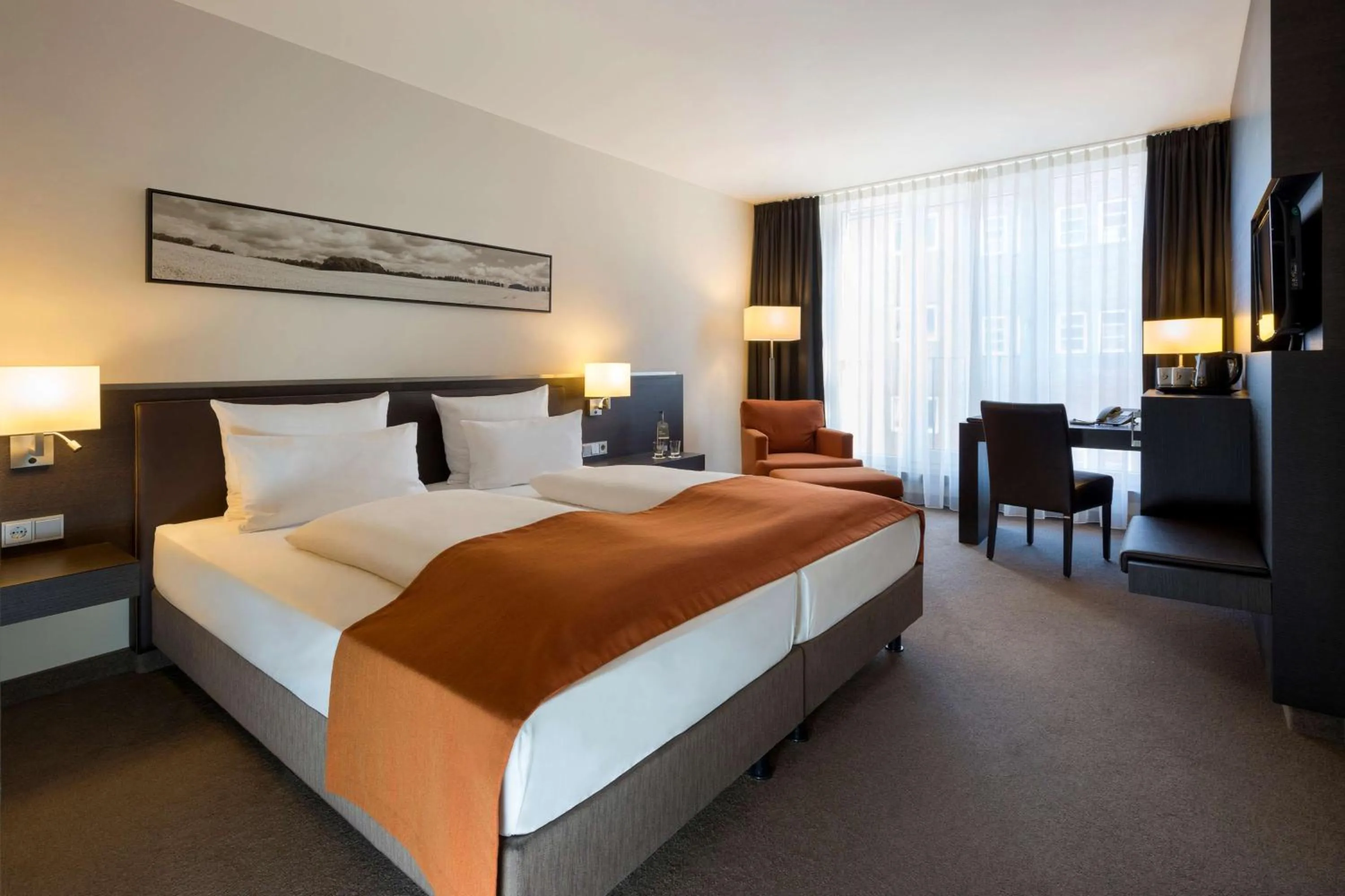 Photo of the whole room, Bed in ATLANTIC Hotel Lübeck