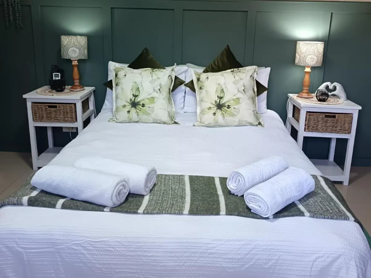 Bed in Bluewater Guesthouse