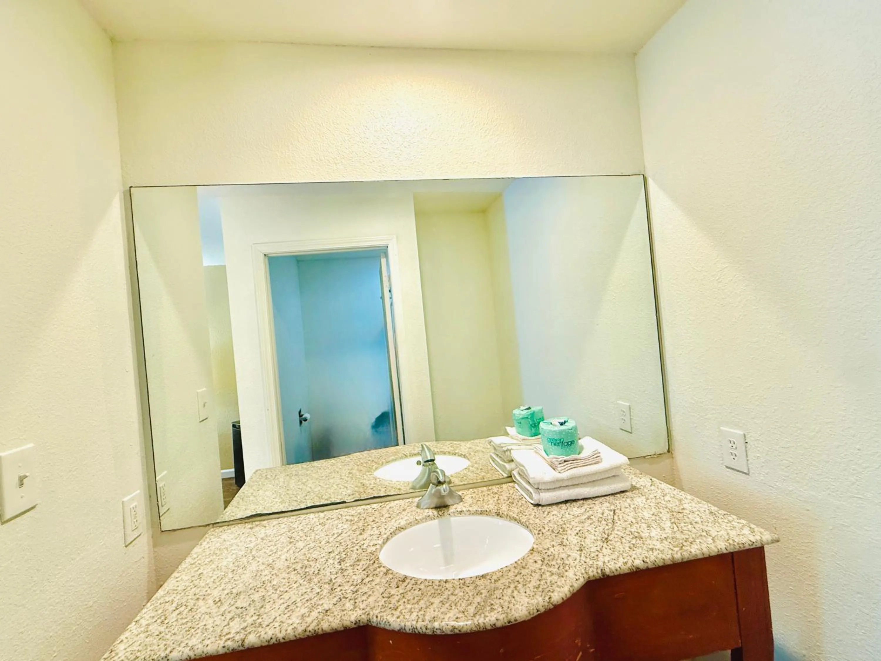 Bathroom in Woodbridge Inn By OYO Rome