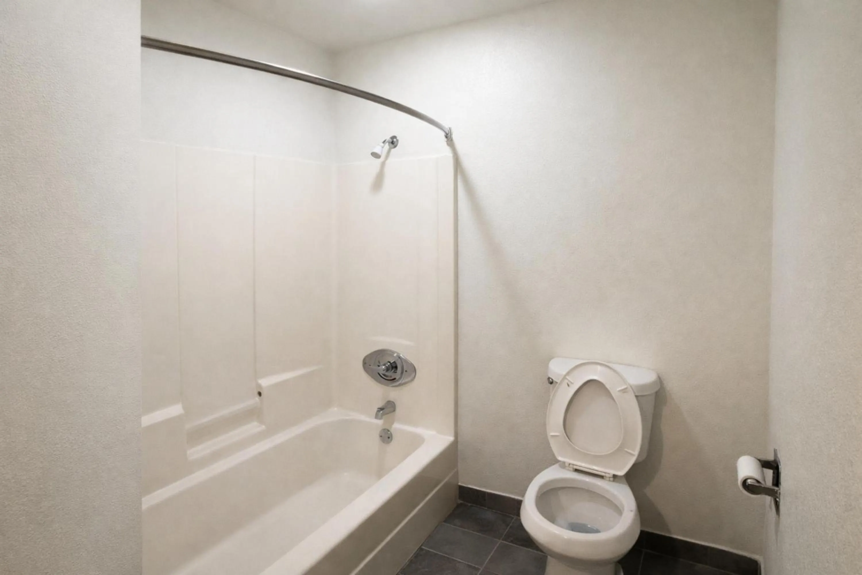 Bathroom in Woodbridge Inn By OYO Rome