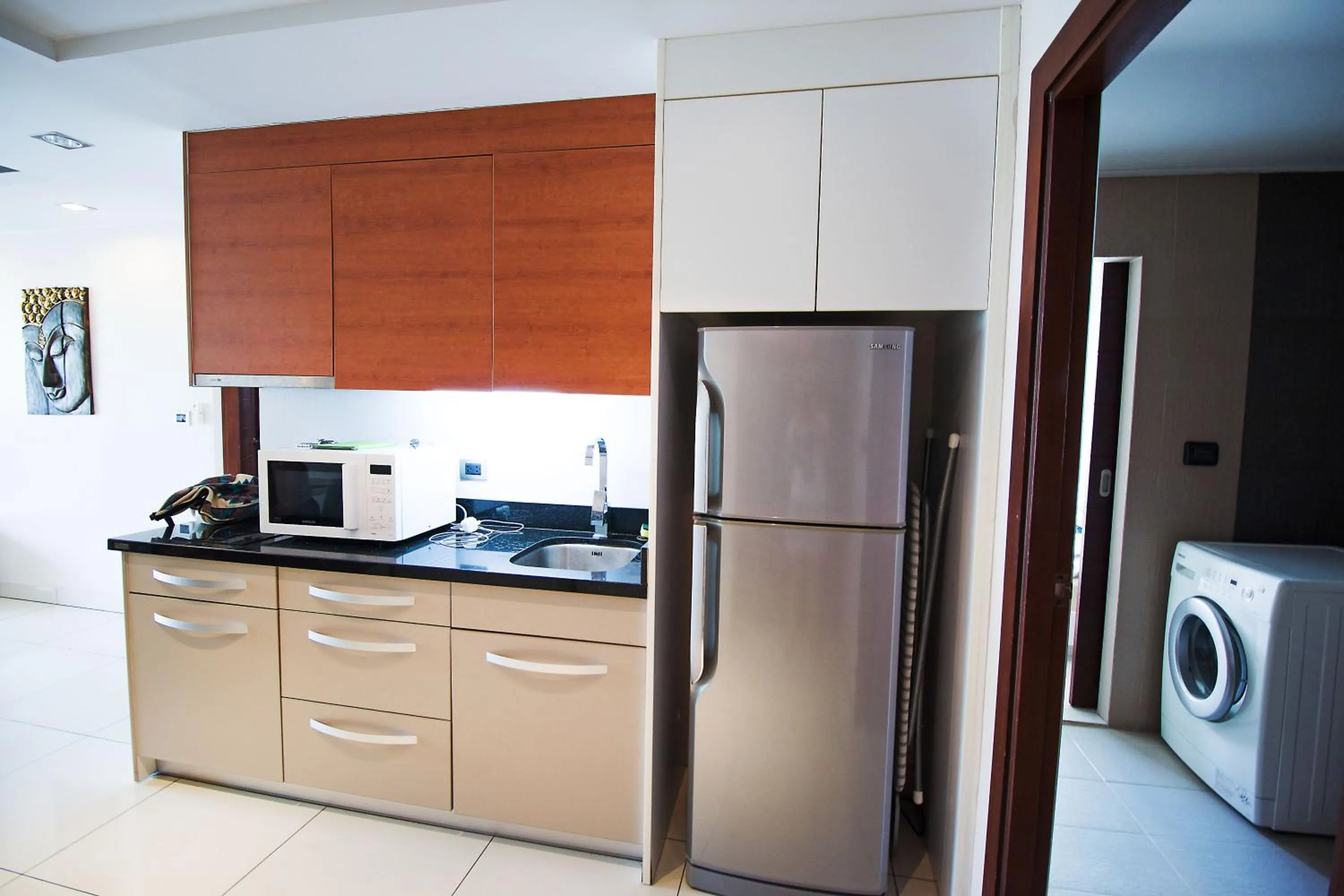 Kitchen or kitchenette in Hyde Park Residence by Pattaya Sunny rentals