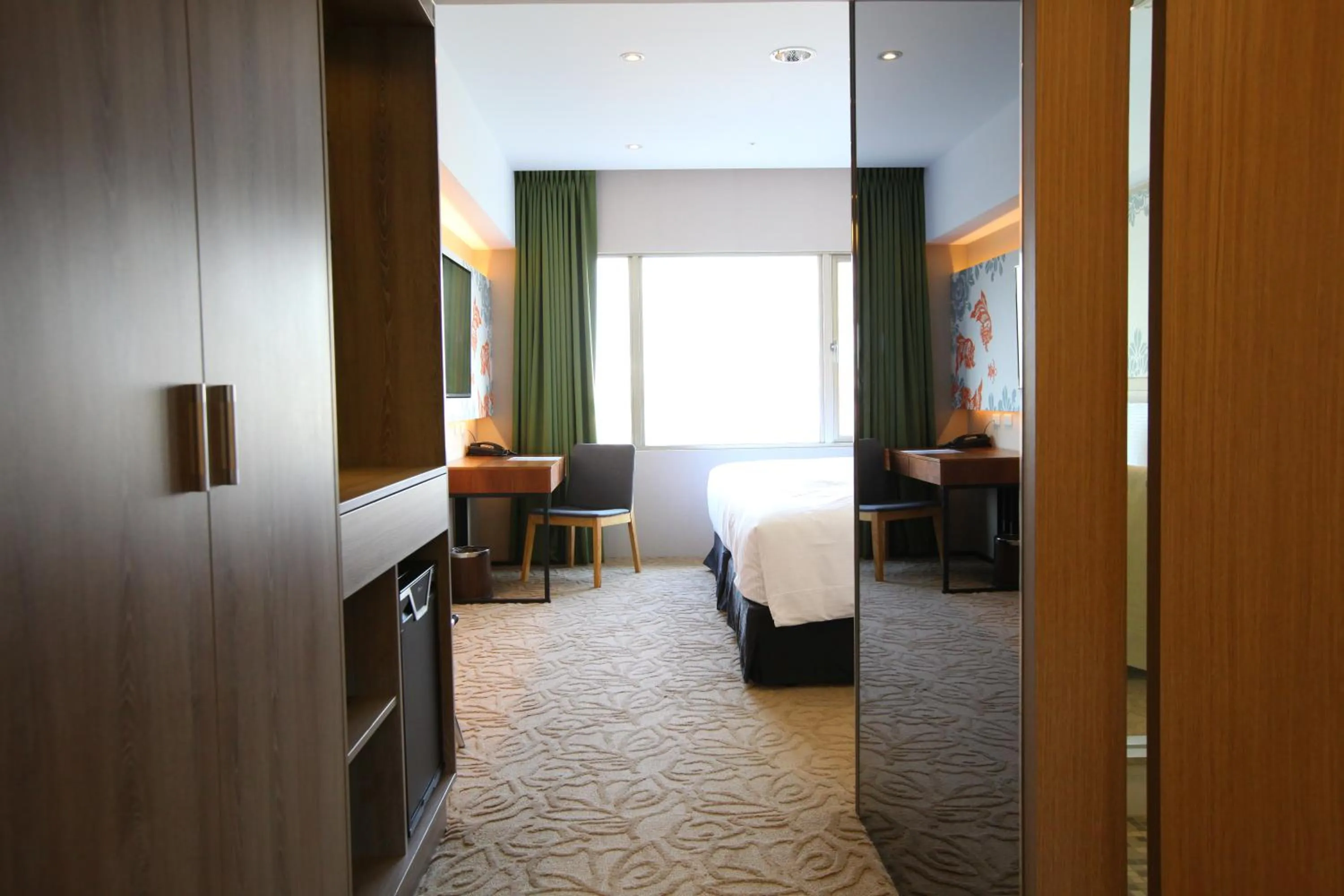 Bed in Aeris International Hotel