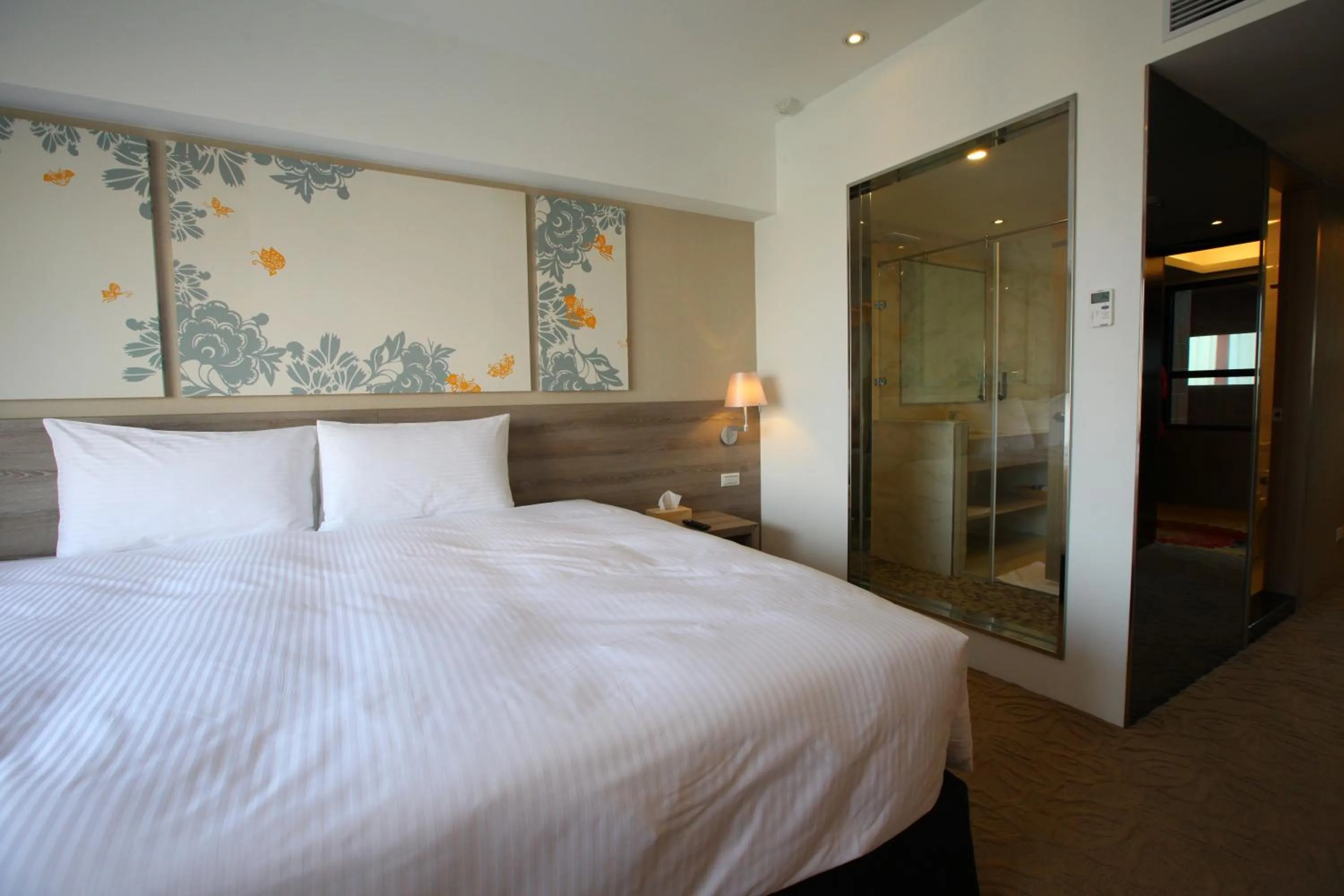 Bed in Aeris International Hotel