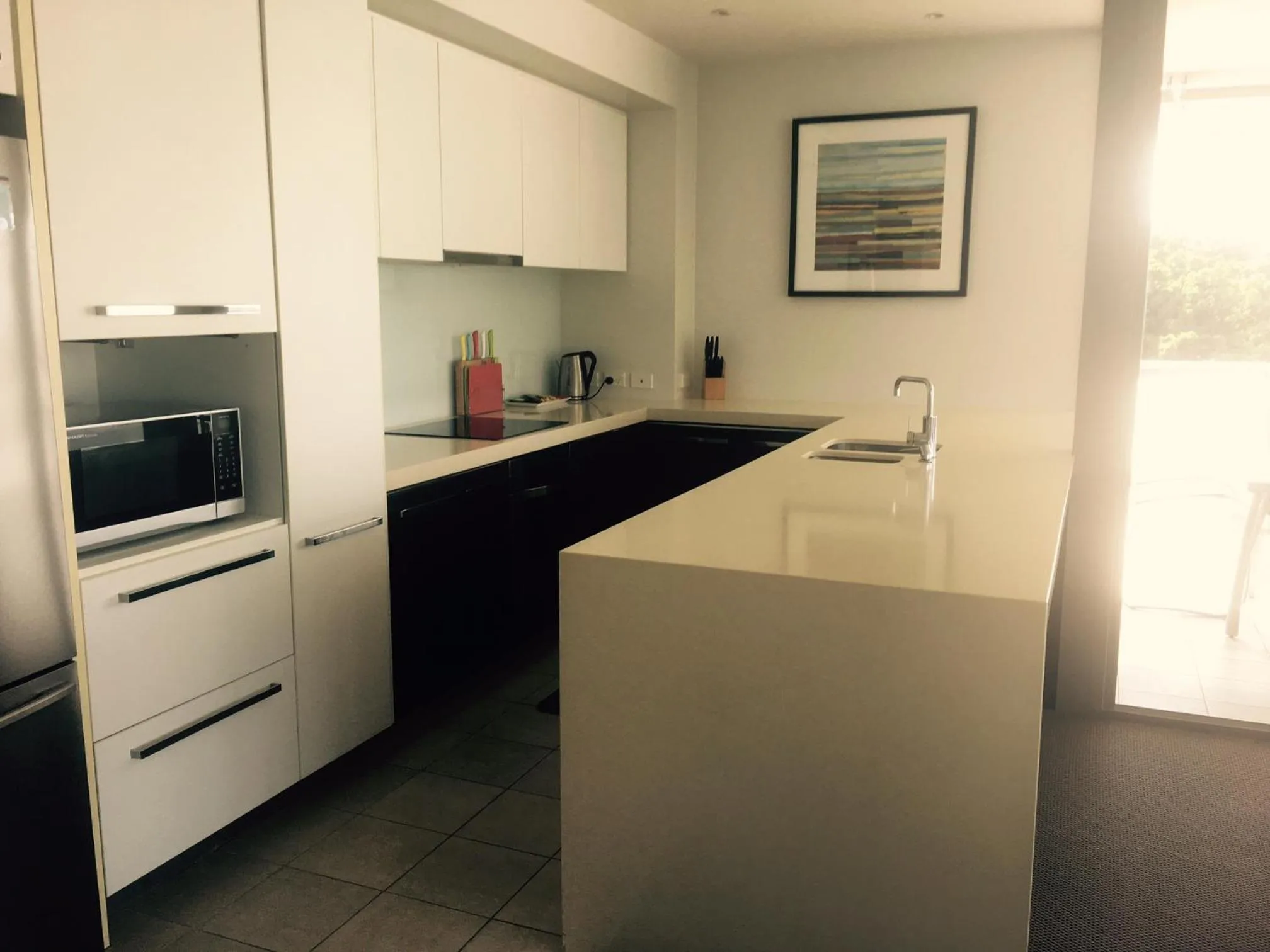 Kitchen or kitchenette in Cairns Private Apartments