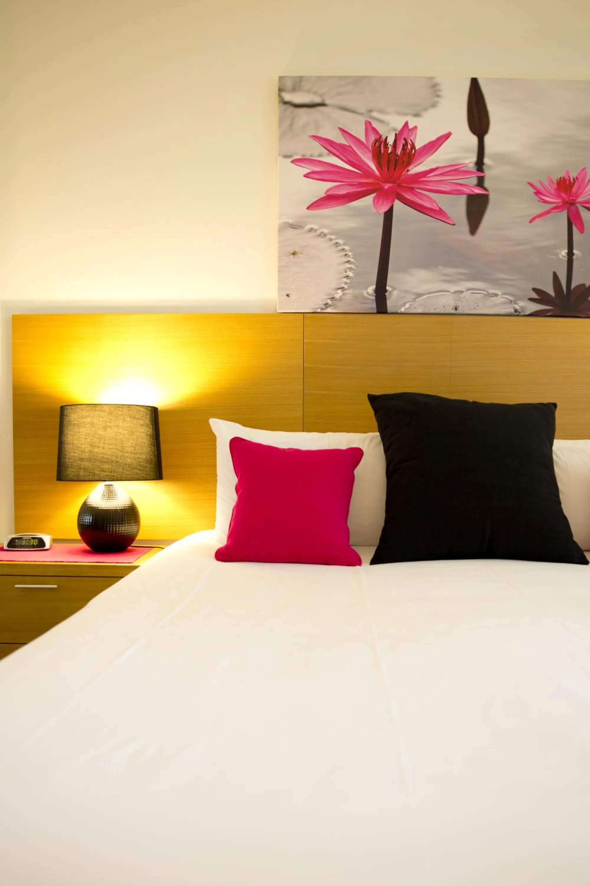 Bed in Cairns Private Apartments